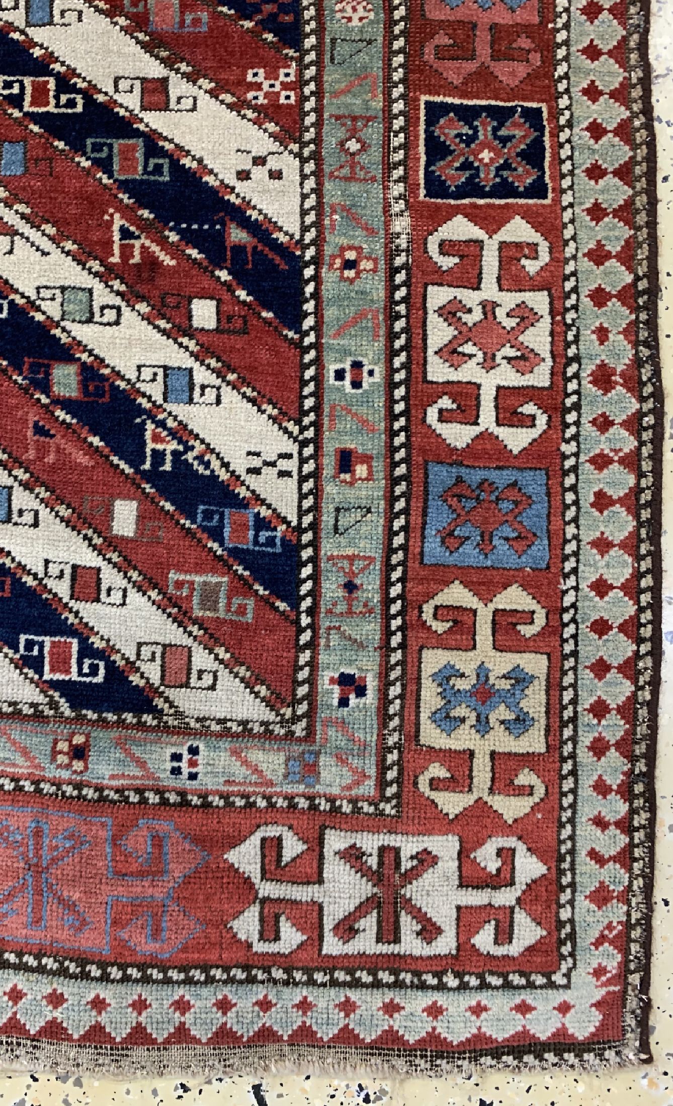 Detail a: Antiker Kazak"Gendje", Kaukasus, 19.Jhd, Wolle auf Wolle, ca. 250 x 111 cm, EHZ: 2-3