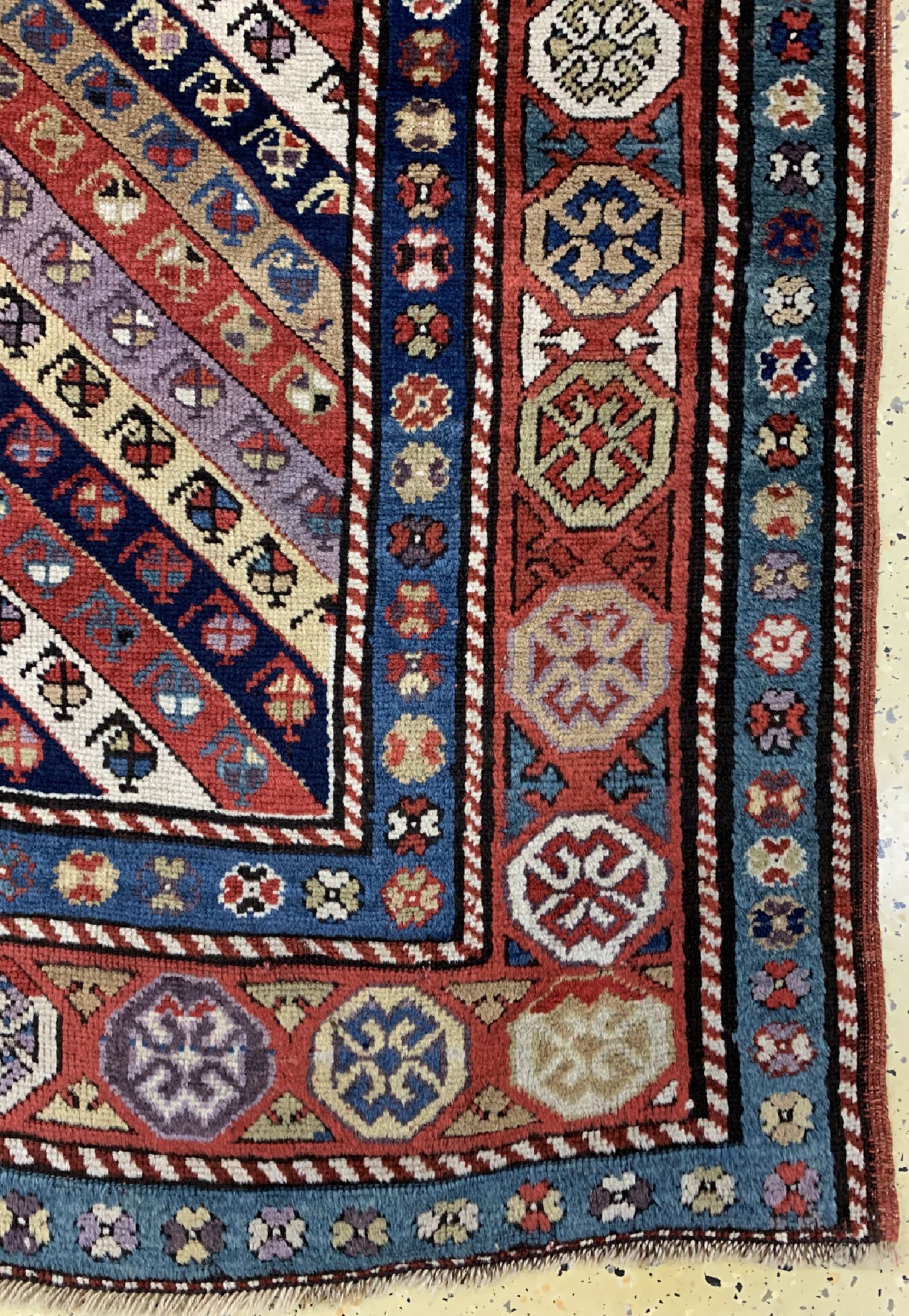Detail a: Antiker Kazak"Gendje", Kaukasus, 19.Jhd, Wolle auf Wolle, ca. 222 x 124 cm, EHZ: 2-3