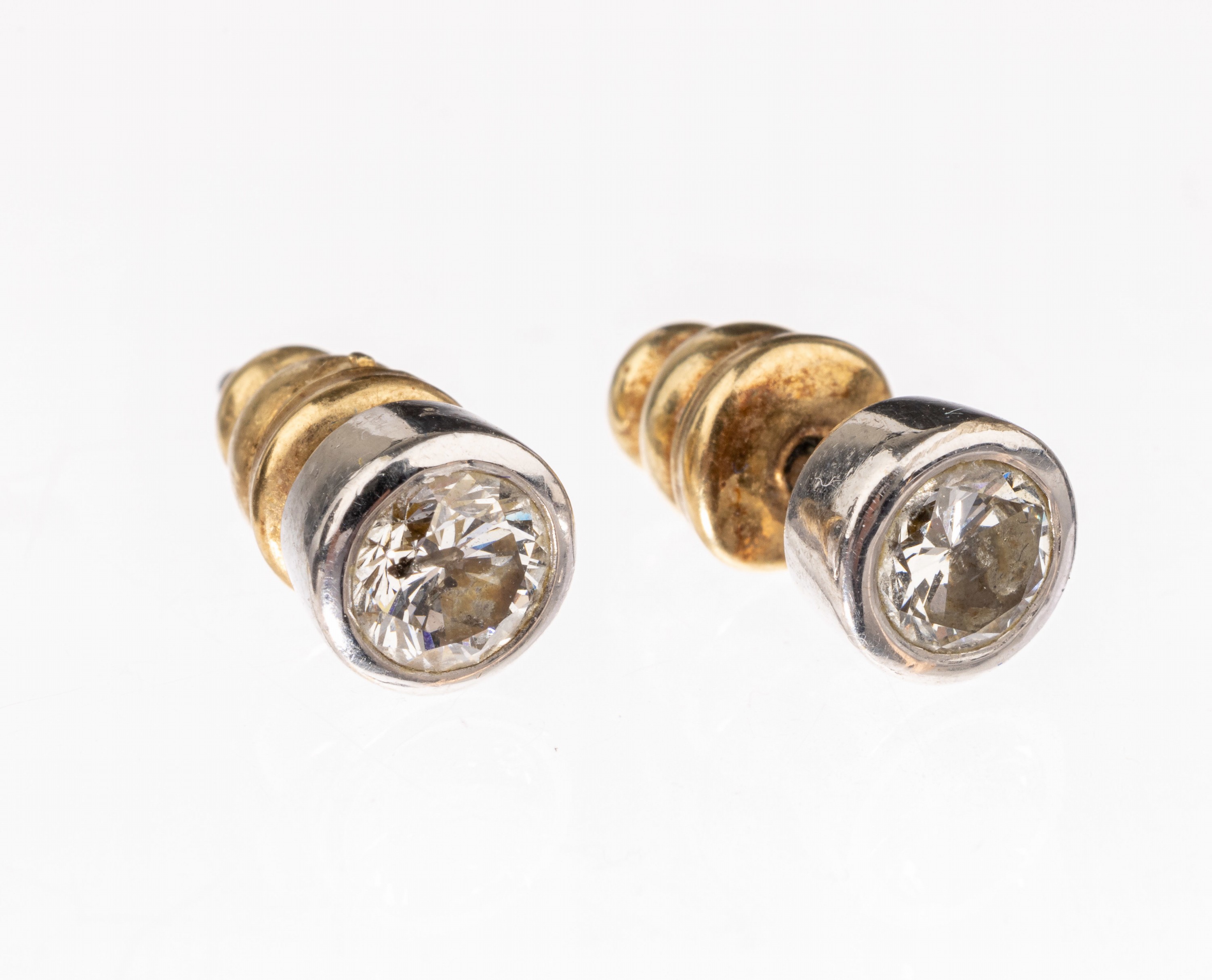 Paar 14 kt Gold Brillant-Ohrstecker, WG 585/000, 2 Brillanten zus. ca. 0.75 ct Weiß/p, Brisuren GG