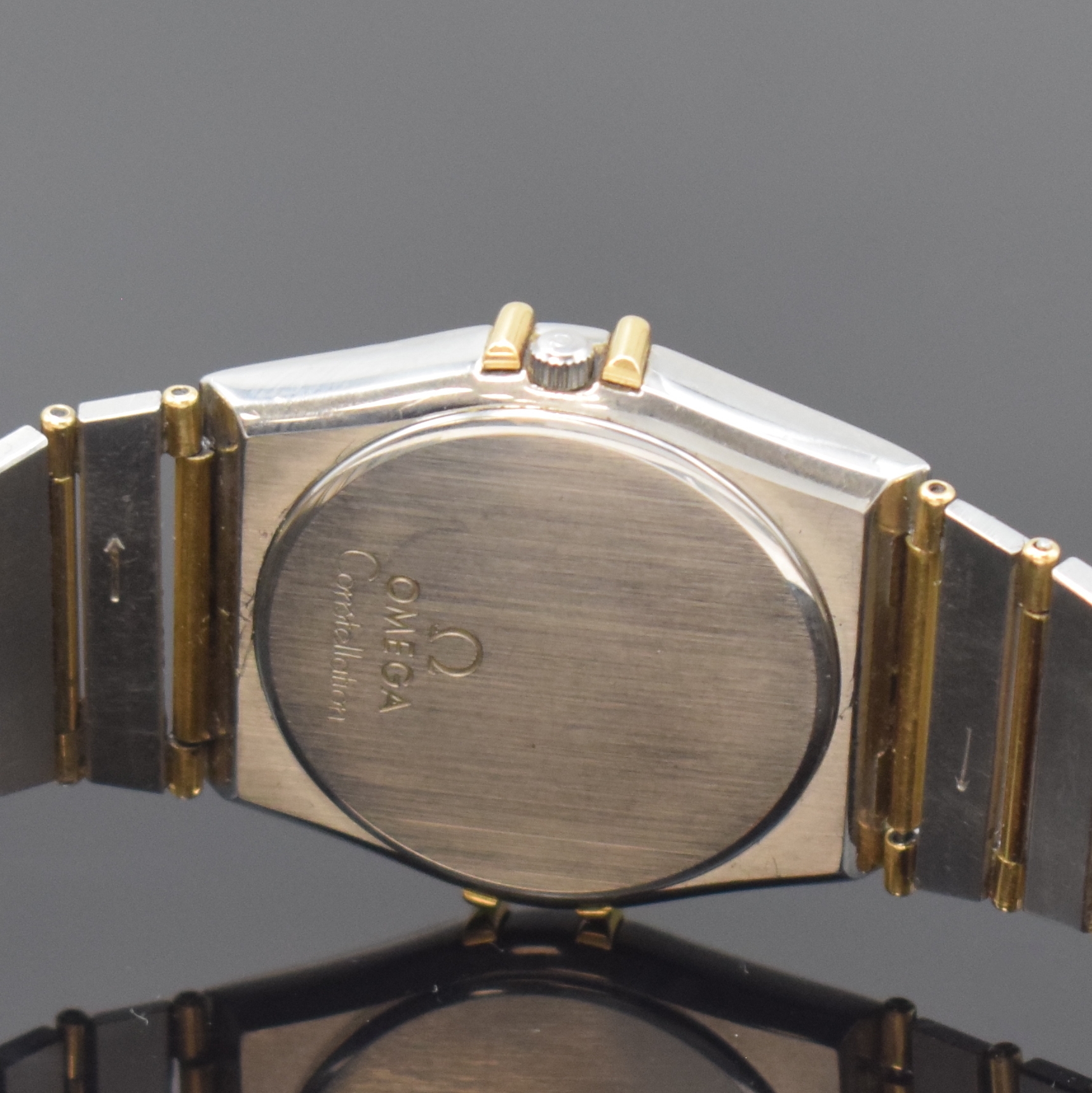 Detail d: OMEGA Herrenarmbanduhr Constellation Referenz 396.1070 / 396.1080, Schweiz um 1990, quarz, Edelstahl/Gold kombiniert inkl. Gliederband m. Faltschl., ...