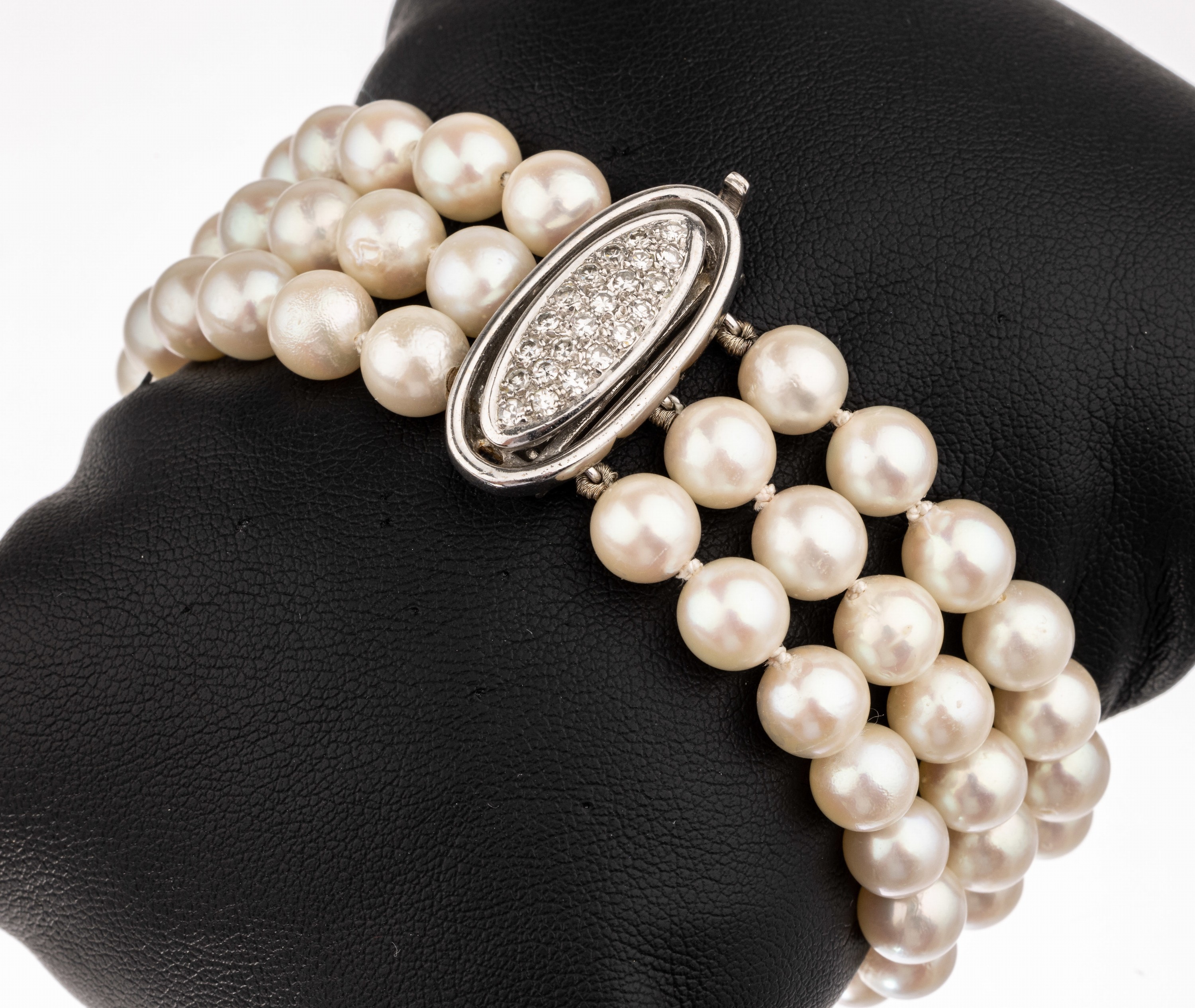 14 kt Gold Akoyazuchtperl-Diamant-Armband, WG 585/000, 3-rhg., Zwischenglieder, Perld. ca. 6.9-7.4 mm, 22 8/8-Diamanten zus. ca. 0.44ct Weiß/si, L. ...