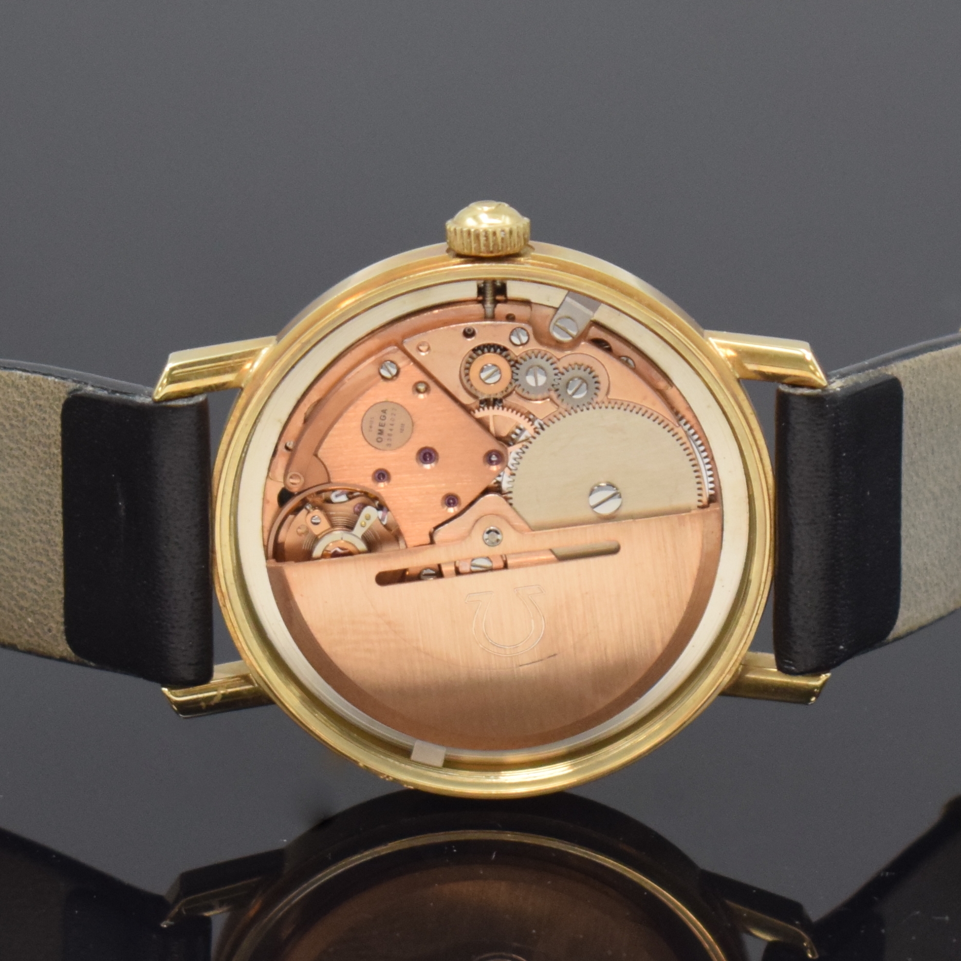 Detail e: OMEGA Geneve Herrenarmbanduhr Referenz 1667071 in GG 585/000, Schweiz um 1972, Automatik, verschr. Geh., orig. Krone, silb. Zifferbl., aufges. gold. ...