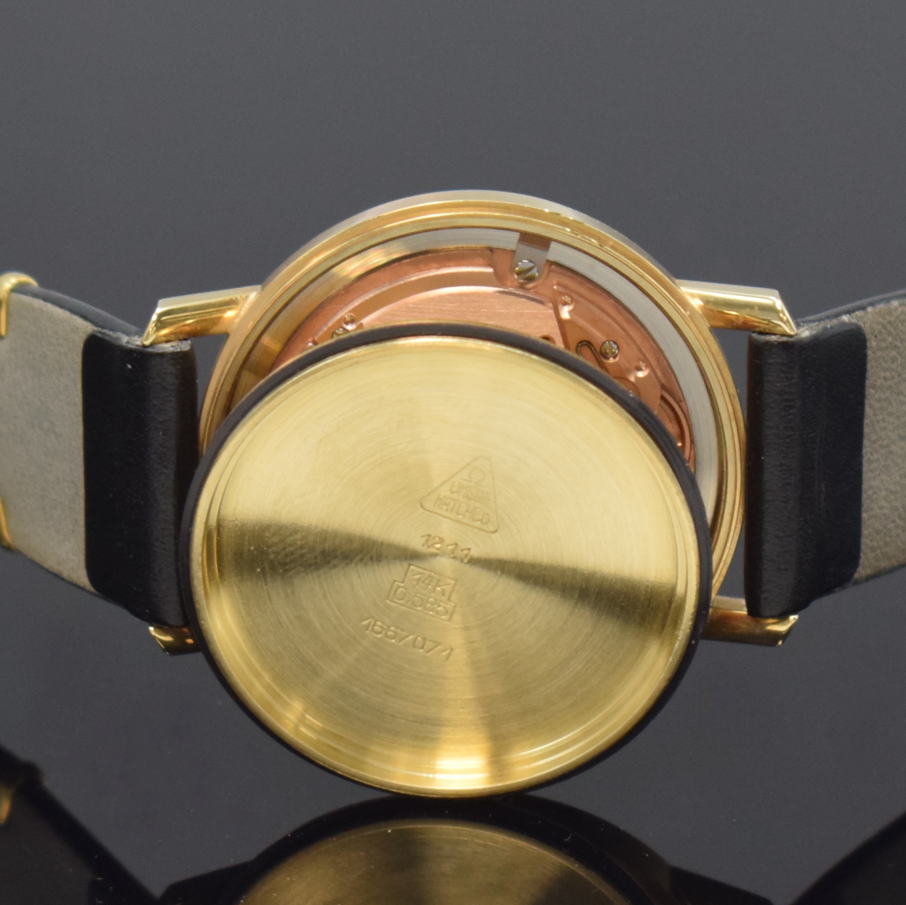 Detail g: OMEGA Geneve Herrenarmbanduhr Referenz 1667071 in GG 585/000, Schweiz um 1972, Automatik, verschr. Geh., orig. Krone, silb. Zifferbl., aufges. gold. ...
