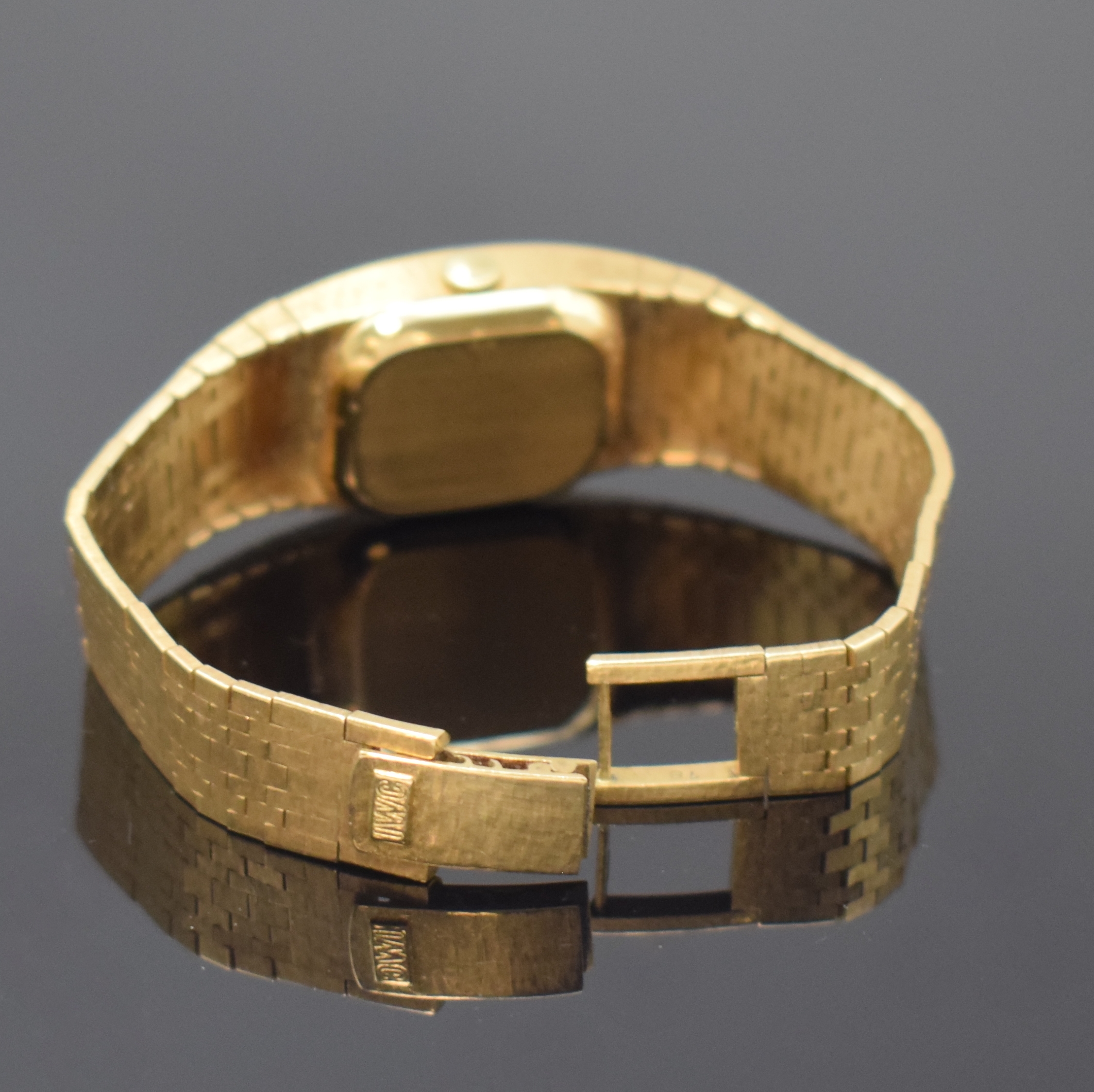 Detail b: IWC Damenarmbanduhr in GG 750/000, Schweiz um 1970, Automatik, 2-tlg. Geh. m. integr. Band, Boden aufgedr., cremefarb. Zifferbl., aufges. gold. ...