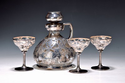Image 26750491 - Carafe with 6 liqueur glasses, around 1920, colorless crystal glass with silver overlay, fine silver coating, on the carafe in the shape of grapes and leaves, partly engraved, glasses with cherries and tendrils, height approx. 18 or 9.5cm