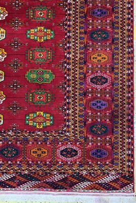 26750534a - Bukhara#"Palace Carpet#", Turkmenistan, commissioned work, approx. 10 years, wool on wool, approx. 720 x 364 cm, lower border discolored, EHZ: 2 (10 cm tear). Antique, old and decorative collector Orientalrugs, Carpets, Textiles and Flatweaves