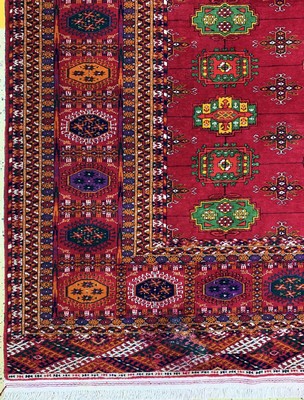 26750534b - Bukhara#"Palace Carpet#", Turkmenistan, commissioned work, approx. 10 years, wool on wool, approx. 720 x 364 cm, lower border discolored, EHZ: 2 (10 cm tear). Antique, old and decorative collector Orientalrugs, Carpets, Textiles and Flatweaves
