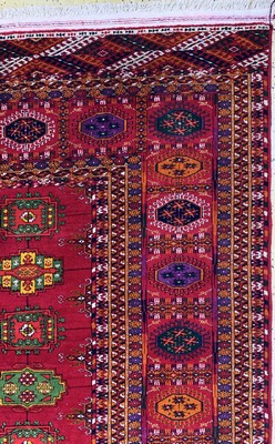 26750534f - Bukhara#"Palace Carpet#", Turkmenistan, commissioned work, approx. 10 years, wool on wool, approx. 720 x 364 cm, lower border discolored, EHZ: 2 (10 cm tear). Antique, old and decorative collector Orientalrugs, Carpets, Textiles and Flatweaves
