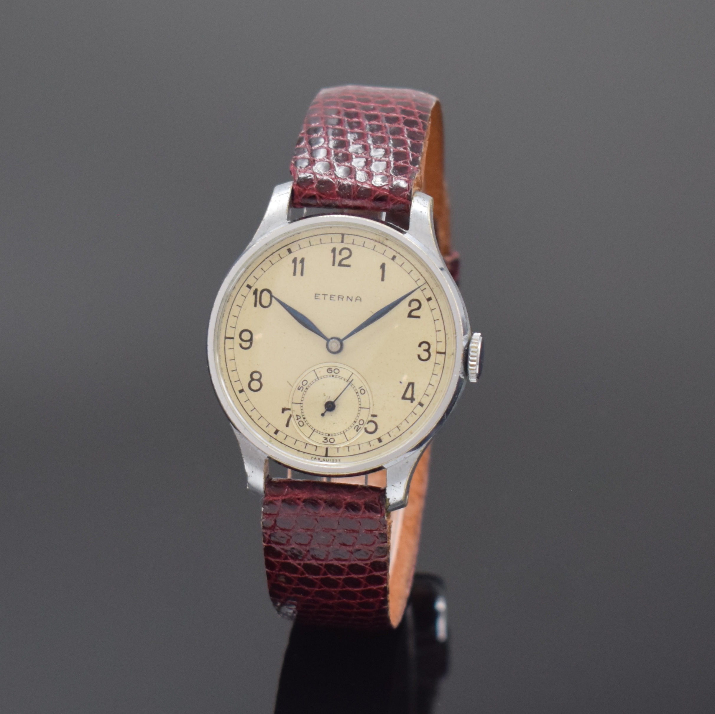 ETERNA frühe Armbanduhr, Schweiz um 1930, Handaufzug, verchromtes Geh., Stahlboden aufgedr., silb. orig. Zifferbl. pat., arab. Zahlen, kl. Sek. b. ...