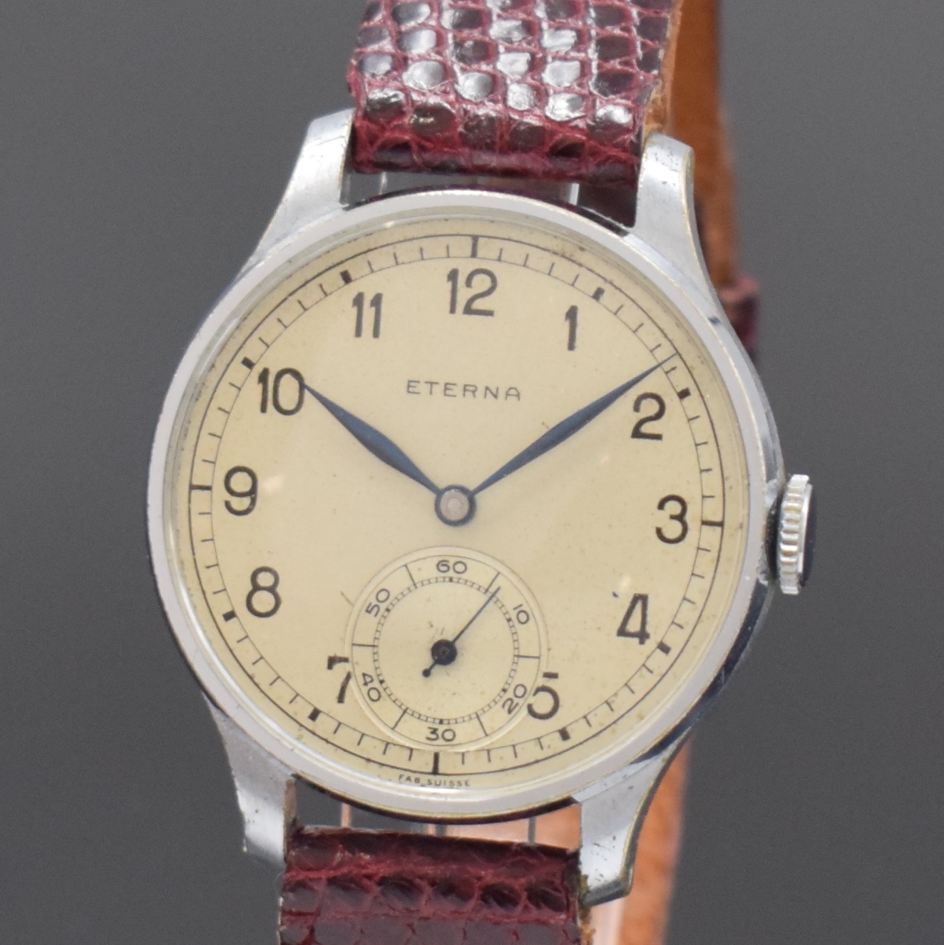 Detail a: ETERNA frühe Armbanduhr, Schweiz um 1930, Handaufzug, verchromtes Geh., Stahlboden aufgedr., silb. orig. Zifferbl. pat., arab. Zahlen, kl. Sek. b. ...