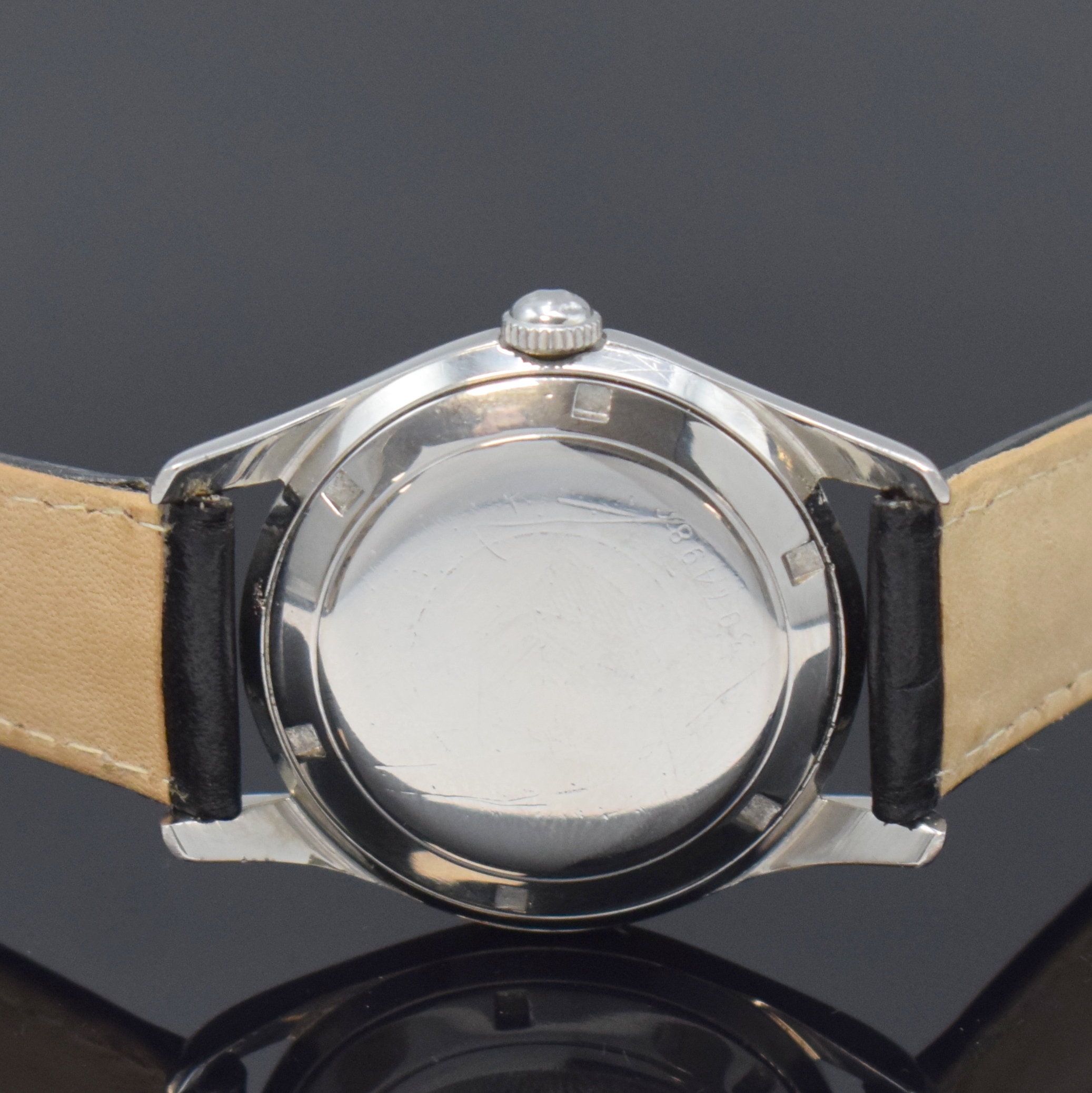Detail c: ETERNA-MATIC Kontiki Herrenarmbanduhr in Stahl, Schweiz um 1955, Automatik (Rotor fehlt), 2-tlg. Geh., verschr. Boden m. grav. Kontiki-Symbol, silb. ...