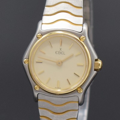 26754081a - EBEL Classic Wave ladies wristwatch in steel/ gold reference 166901, Switzerland around 1990, quartz, by bezel 5-times screwed down, wave bracelet, cream colored dial with applied gilded hour-indices, gilded hands, diameter approx. 24 mm, length approx. 17 cm, condition 2