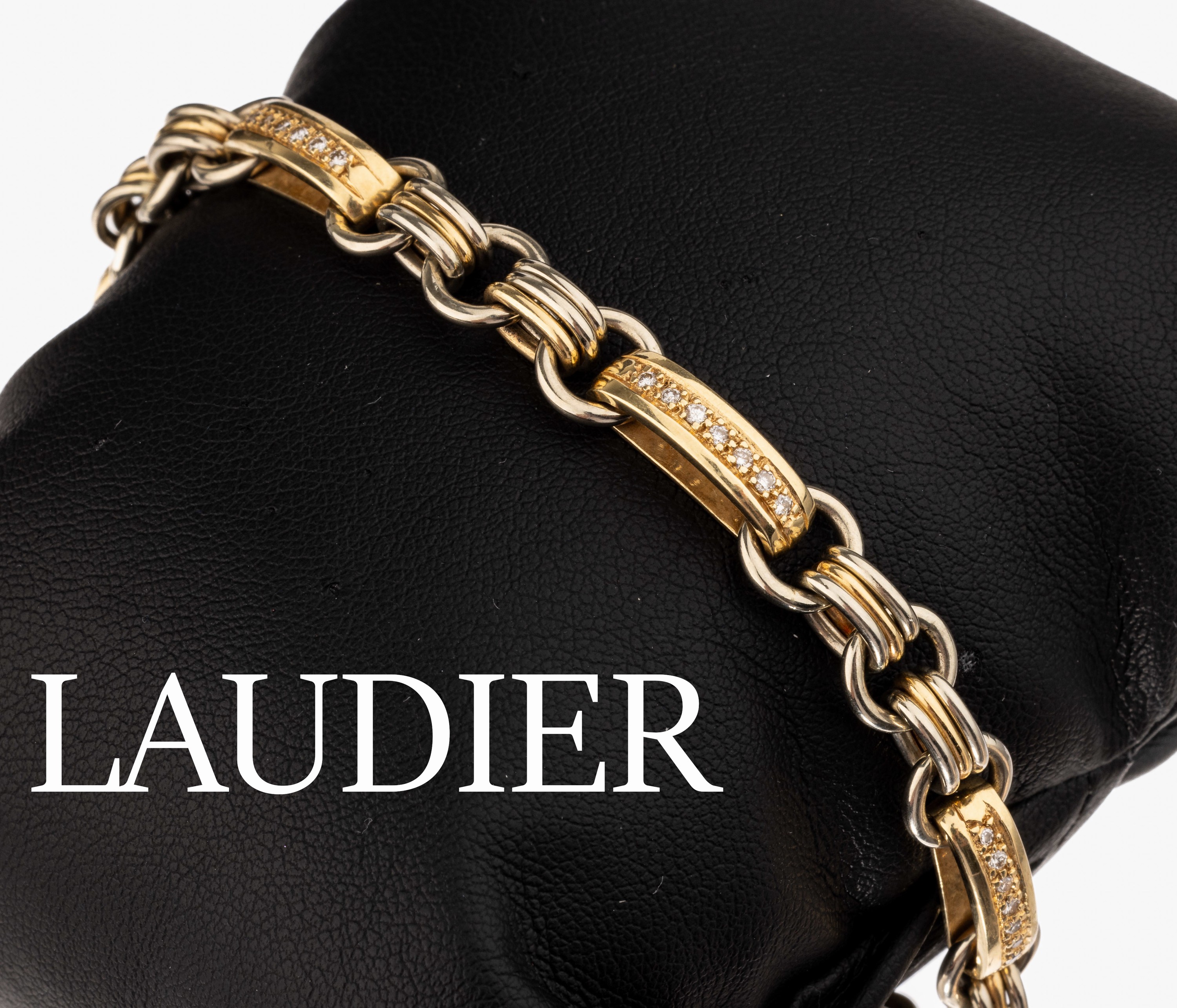 14 kt Gold LAUDIER Brillant-Armband, GG/WG 585/000, Brillanten zus. ca. 0.47 ct (grav.) Weiß/si, Saphir-Cabochon auf Schließe ca. 0.12ct, ca. 26.0 ...