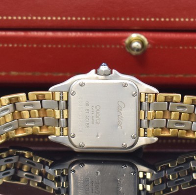 26754729e - CARTIER Panthere ladies wristwatch in steel/gold, Switzerland around 1990, quartz, back with 8 screws, original bracelet with butterfly buckle, silvered dial with Roman numerals, blued steel hands, jeweled crown, measures approx. 29 x 22 mm, length approx. 17,5 cm, condition 2-3