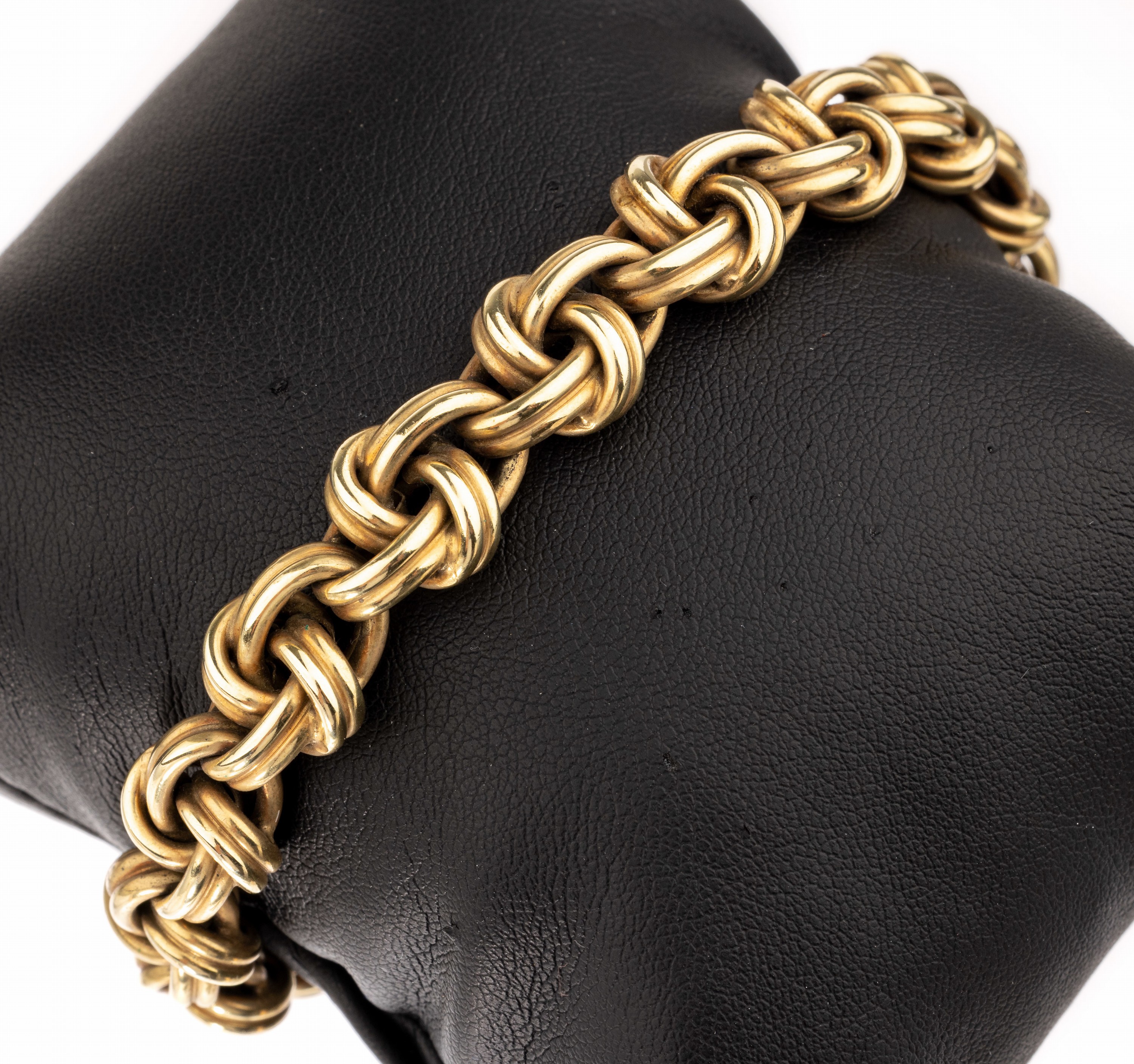 14 kt Gold Armband, GG 585/000, Glieder in Knotenform, L. ca. 21 cm, Kastenschloss mit 2 Sicherheitsachten, ca. 27.4 g