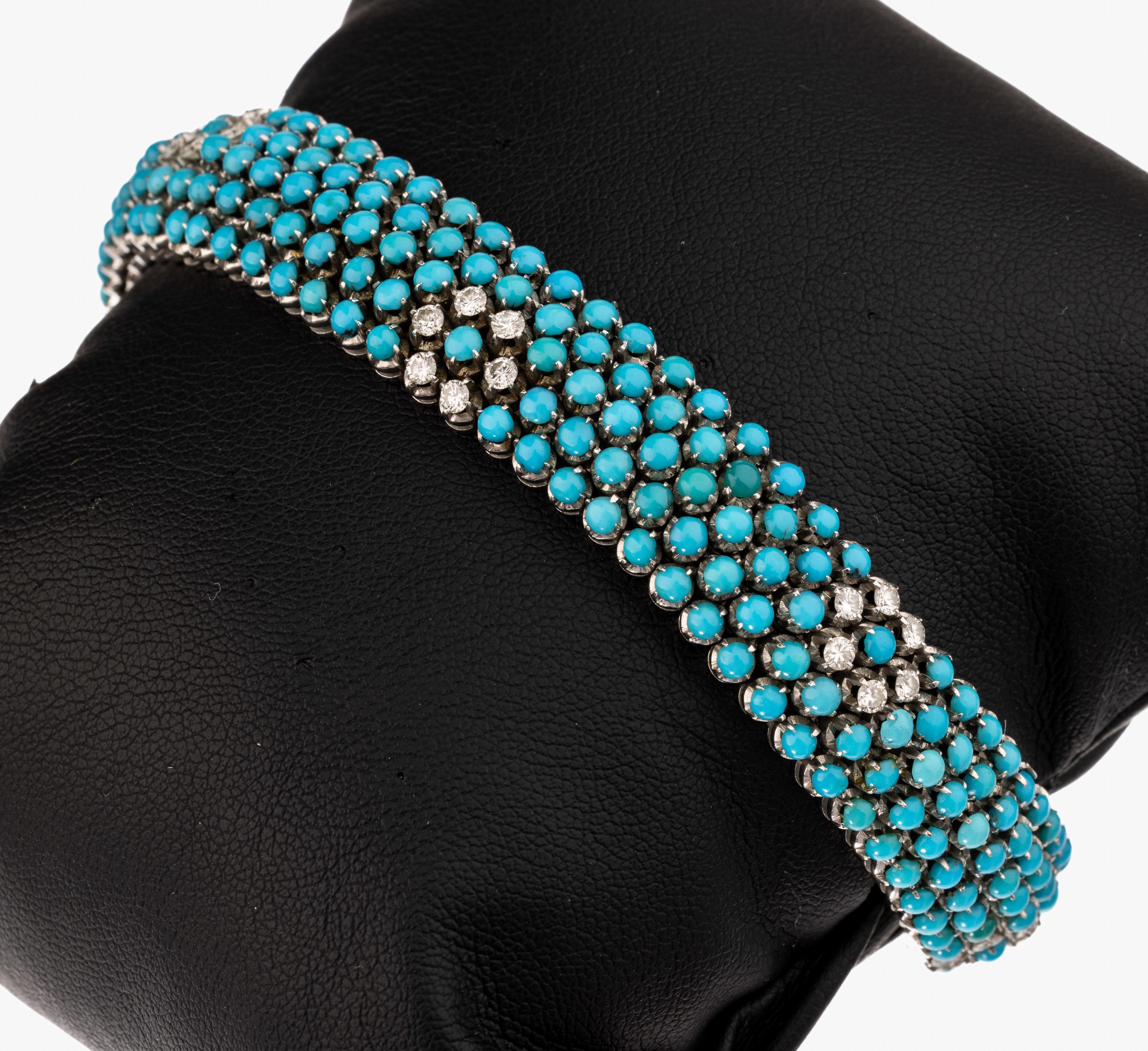 18 kt Gold Brillant-Türkis Armband, WG 750/000, 36 Brillanten blütenförmig gefasst zus. ca. 1.08 ct Weiß/vs-si, 5-reihig mit Türkis-Cabochons ...