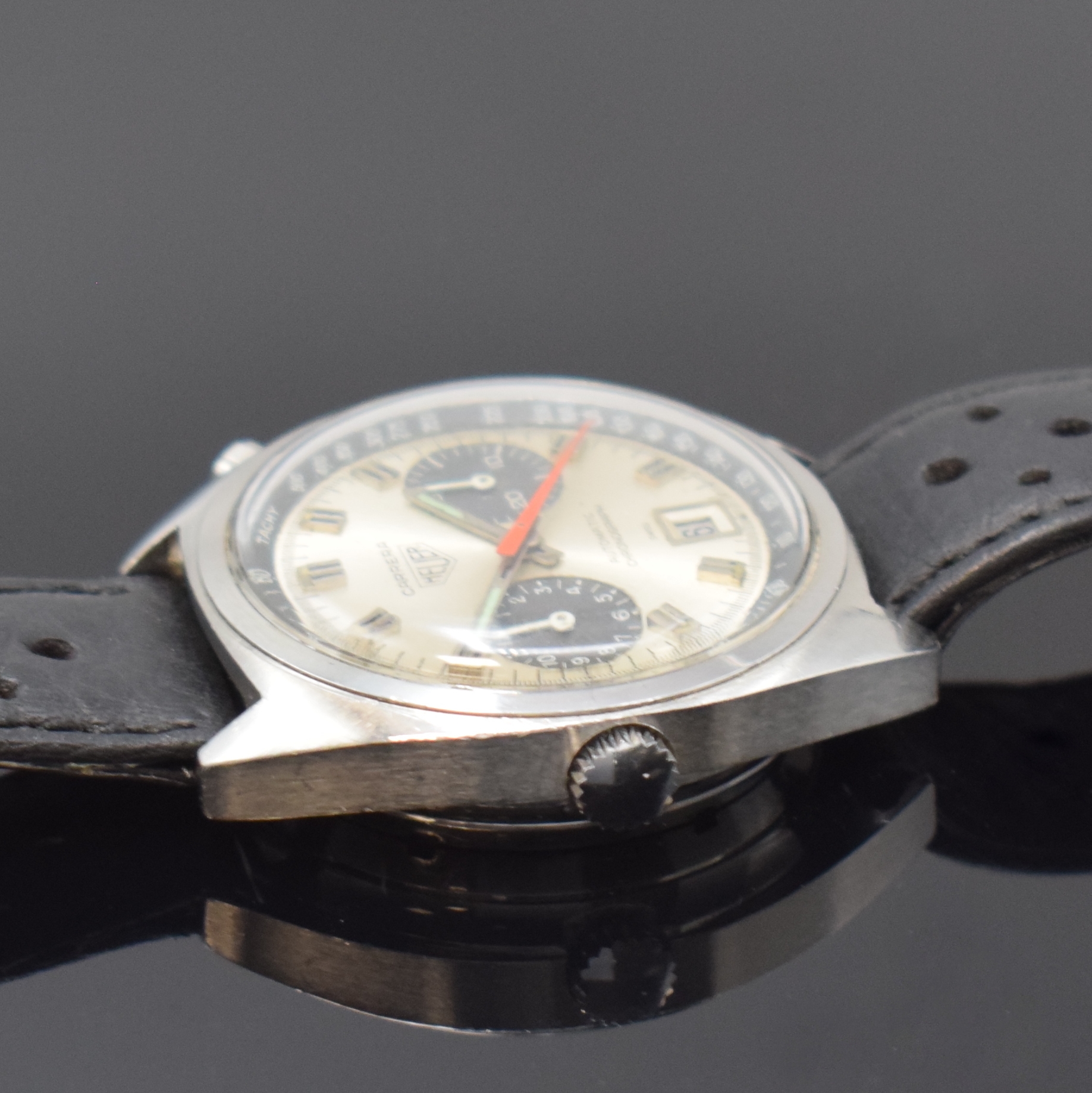 Detail b: HEUER Carrera Armbandchronograph mit Kaliber 12 Referenz 1153, Schweiz um 1970, Automatik, Boden verschr., orig. Drücker, Krone später, silb. ...