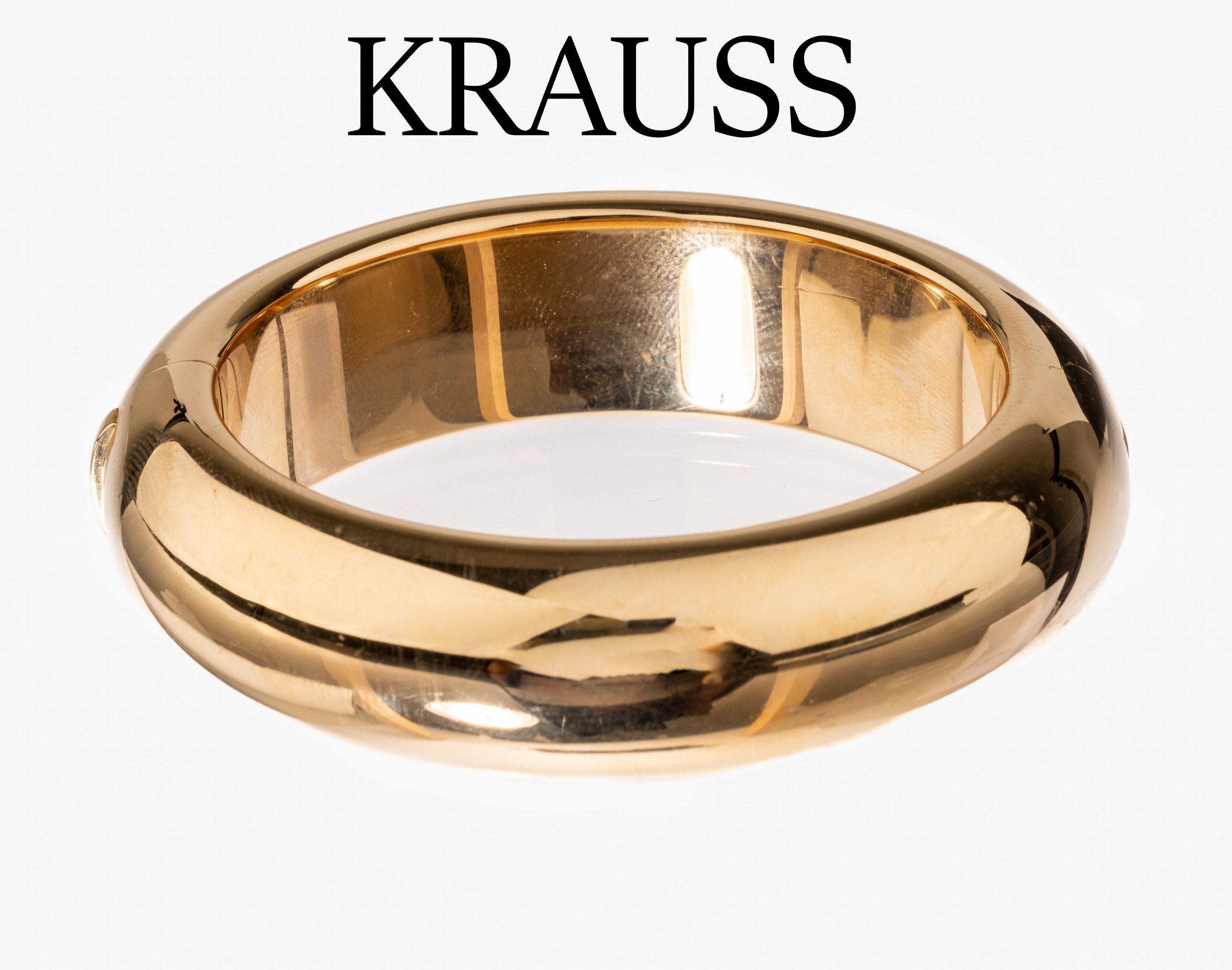 18 kt Gold Armreif, GG 750/000, hohl gearbeitet, schlicht, B. ca. 1.9 cm, ca. 6 x 5.1 cm, Klappscharnier, Kastenschloss, ca. 94.3 g, Hersteller ...