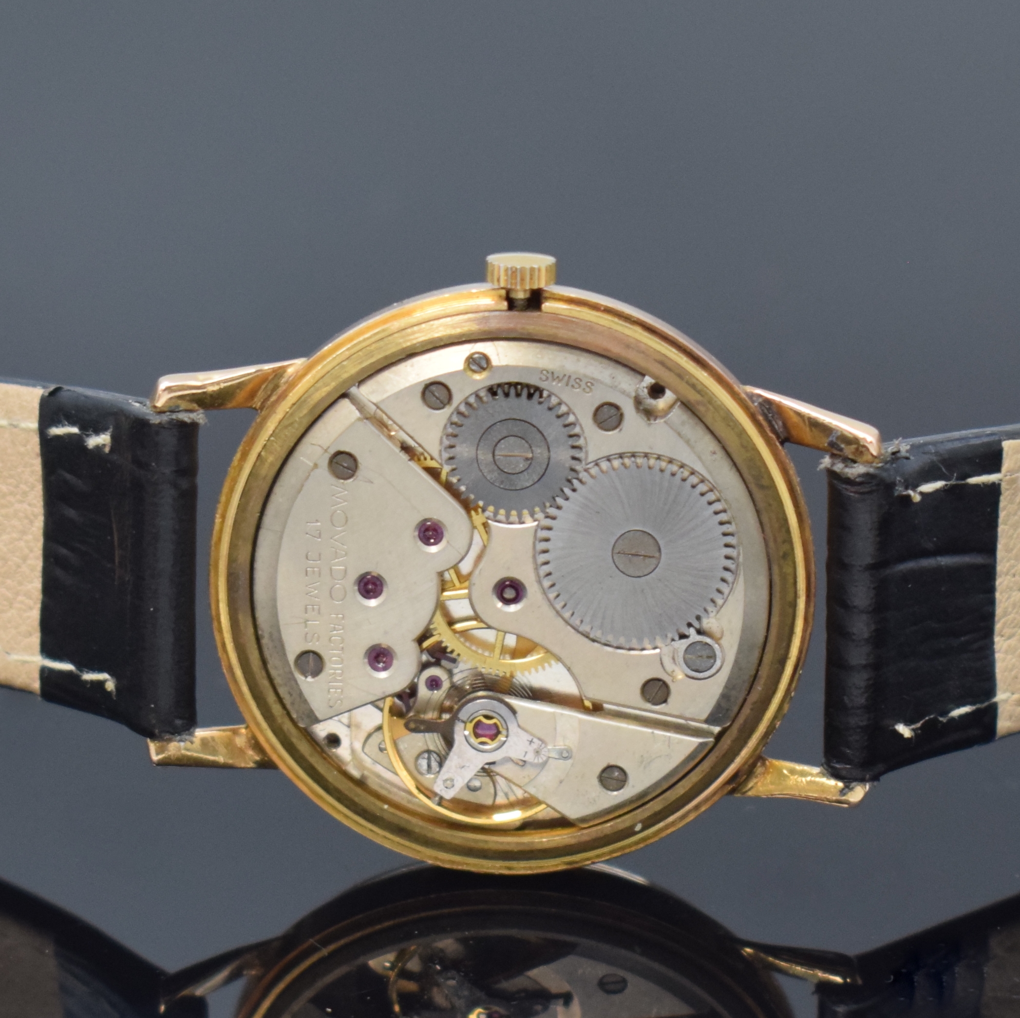Detail d: MOVADO Celebrity Armbanduhr in RG 750/000, Schweiz um 1965, Handaufzug, neutrales 2-tlg. Geh., Boden aufgedr., rotgold. Zifferbl., rotgold. Indizes ...