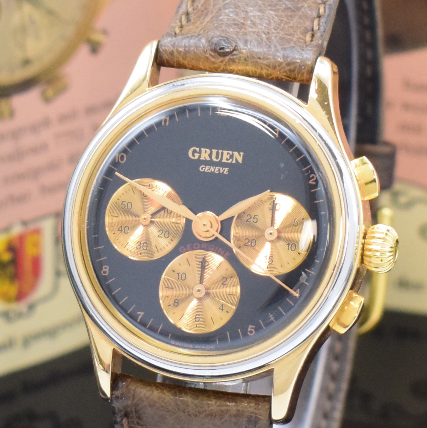 Detail a: GRUEN "Georgine" Armbandchronograph in WG/RoseG 750/000, Schweiz um 1994, Handaufzug, schweres Geh., Boden aufgedr., schwarzes Zifferbl. m. ...