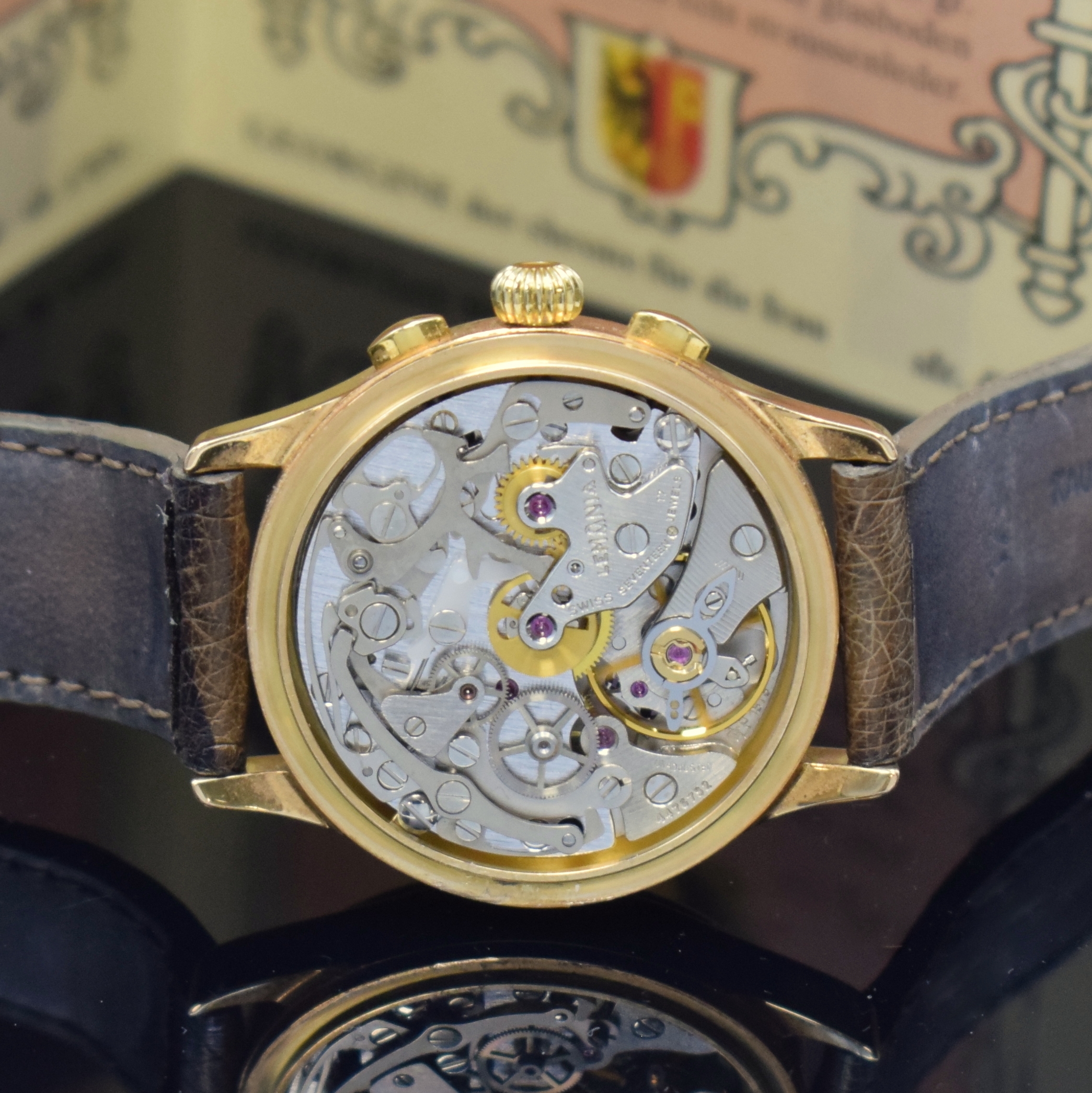 Detail e: GRUEN "Georgine" Armbandchronograph in WG/RoseG 750/000, Schweiz um 1994, Handaufzug, schweres Geh., Boden aufgedr., schwarzes Zifferbl. m. ...