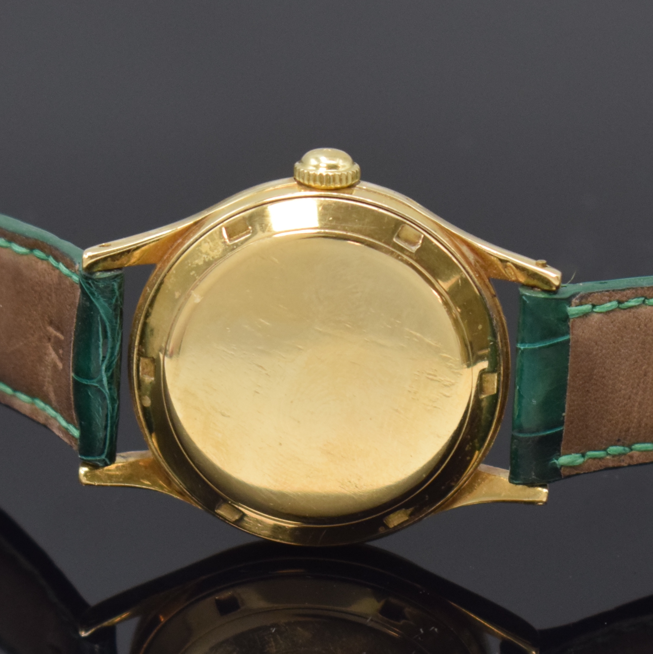 Detail c: HUGUENIN Automatic verschraubte Armbanduhr in GG 750/000, Schweiz um 1955, massives 2-tlg. Geh., silb. orig. Zifferbl., aufges. gold. Indizes, gold. ...