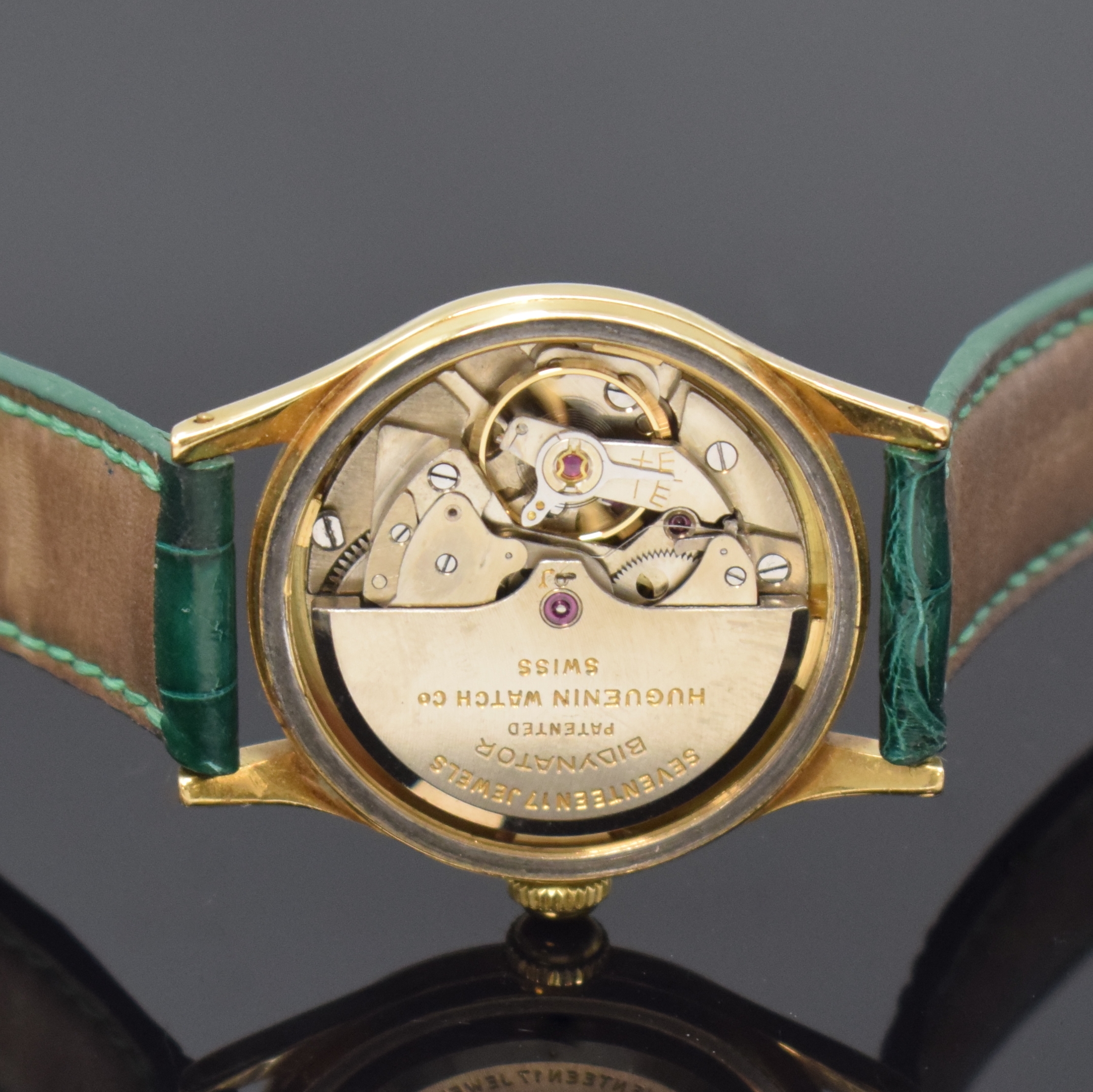 Detail e: HUGUENIN Automatic verschraubte Armbanduhr in GG 750/000, Schweiz um 1955, massives 2-tlg. Geh., silb. orig. Zifferbl., aufges. gold. Indizes, gold. ...