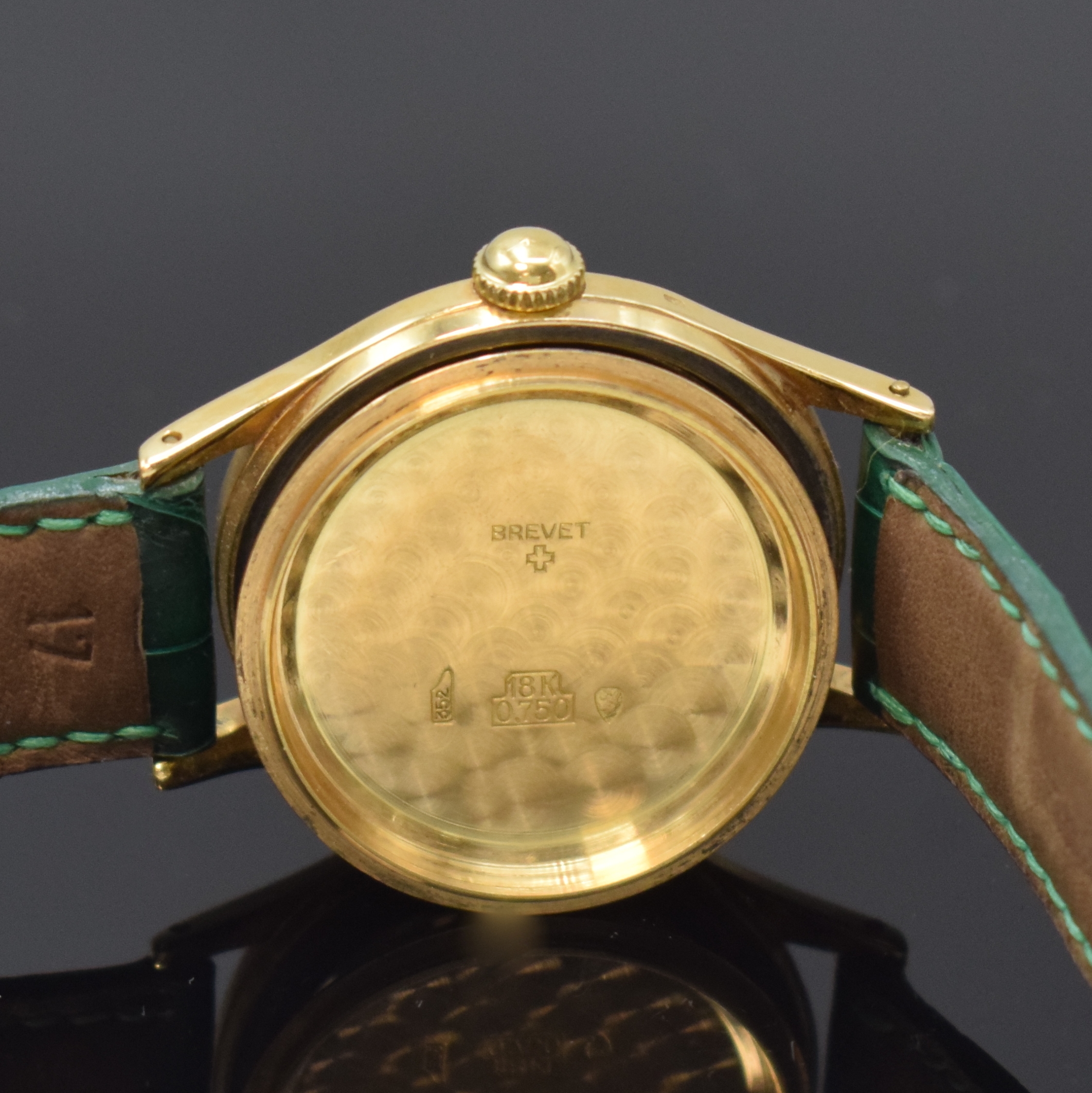 Detail f: HUGUENIN Automatic verschraubte Armbanduhr in GG 750/000, Schweiz um 1955, massives 2-tlg. Geh., silb. orig. Zifferbl., aufges. gold. Indizes, gold. ...