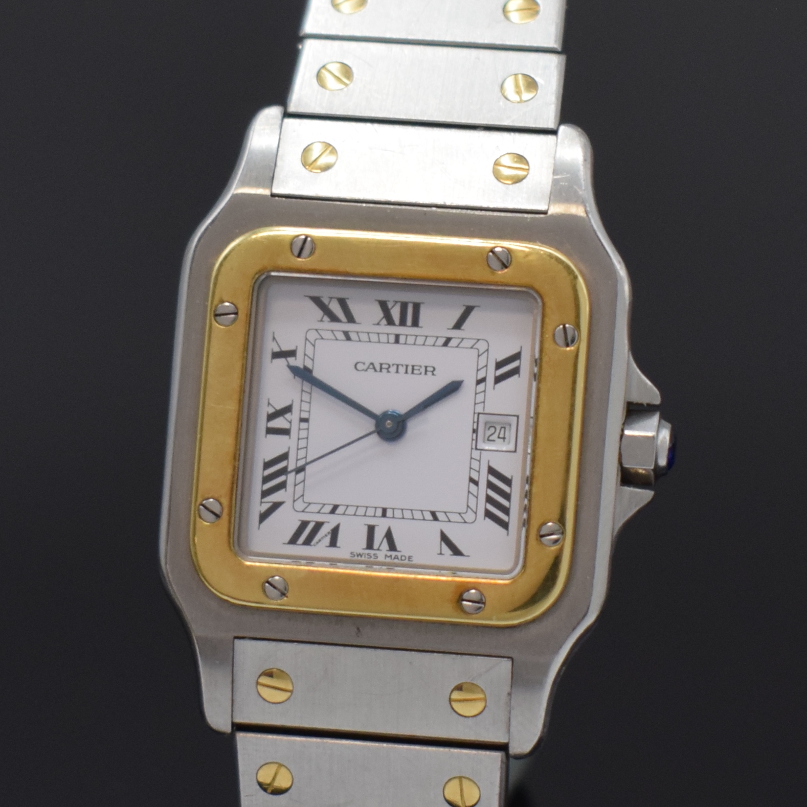 Detail a: CARTIER Santos Herrenarmbanduhr, Schweiz um 1985, Automatik, Edelstahl/Gold kombiniert inkl. Gliederband m. Faltschl., Monocoque- Geh., Lünette ...