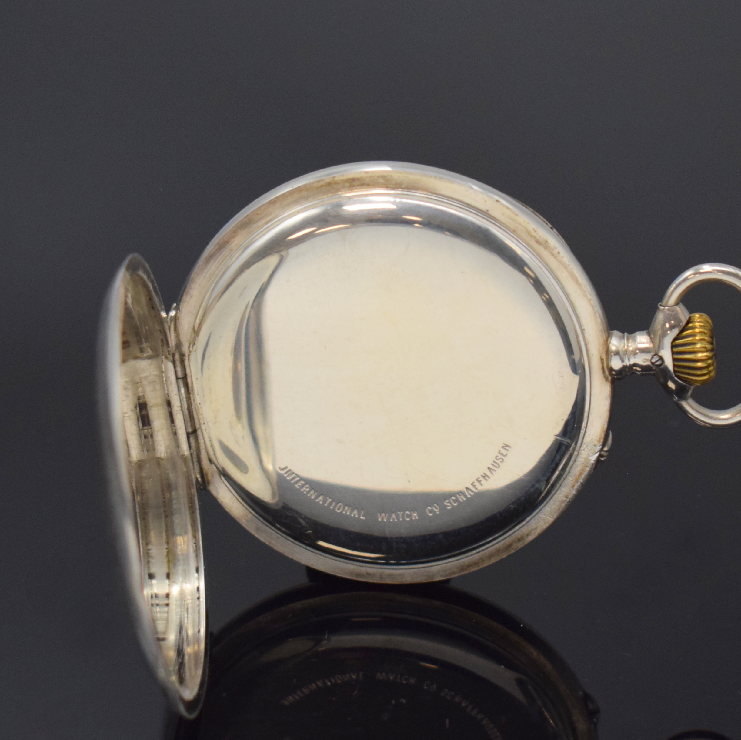 Detail c: IWC offene Herrentaschenuhr in Silber, Schweiz um 1917, glattes Geh., sign. 2-tlg. Emailzifferbl. riss., Breguetzahlen, gold. Breguetzeiger, verg. ...
