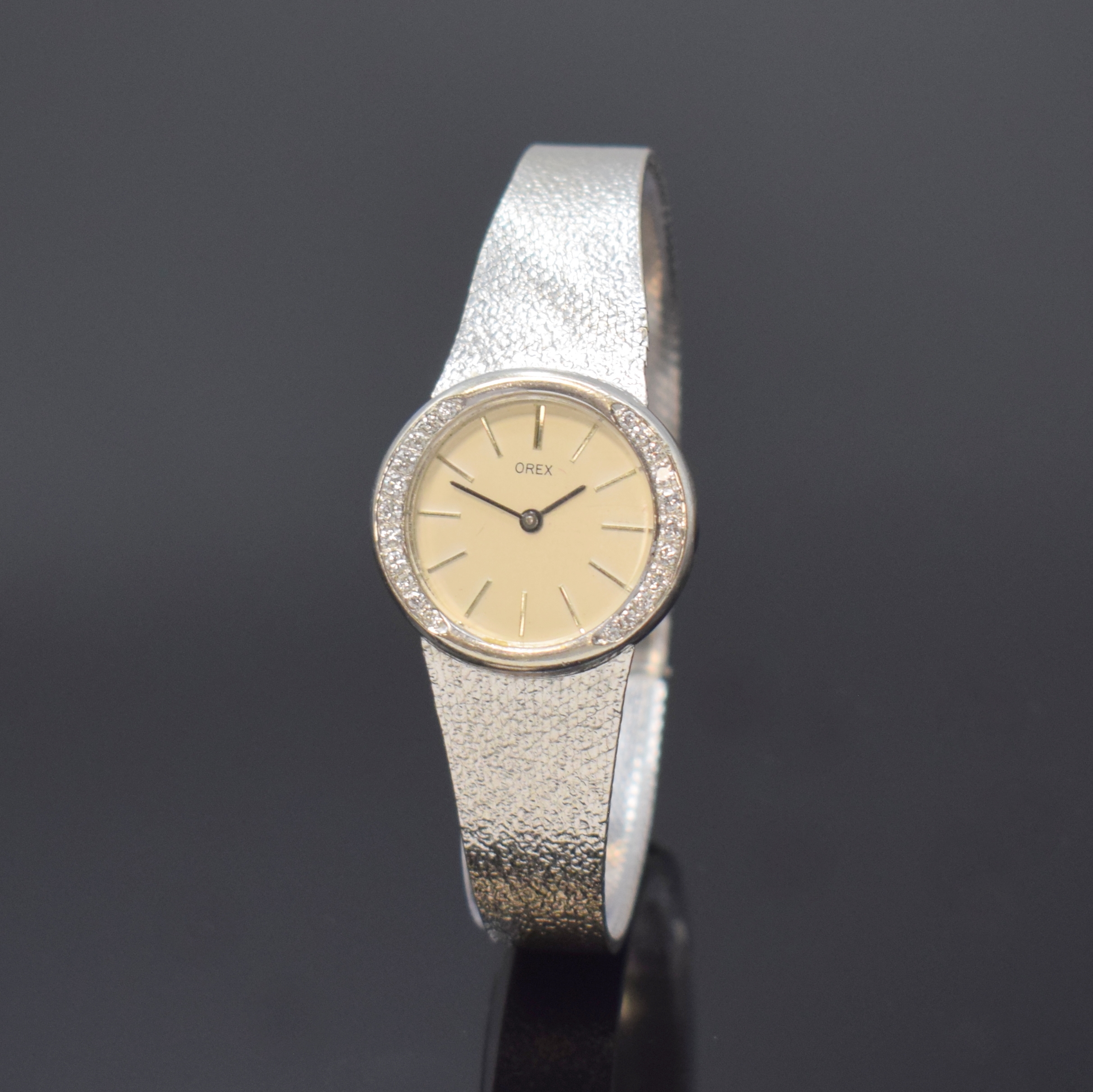 OREX diamantbesetzte Damenarmbanduhr in WG 585/000, Deutschland/Schweiz um 1970, Handaufzug, 2-tlg. Geh. m. integr. Milanaiseband, Boden aufgedr., ...