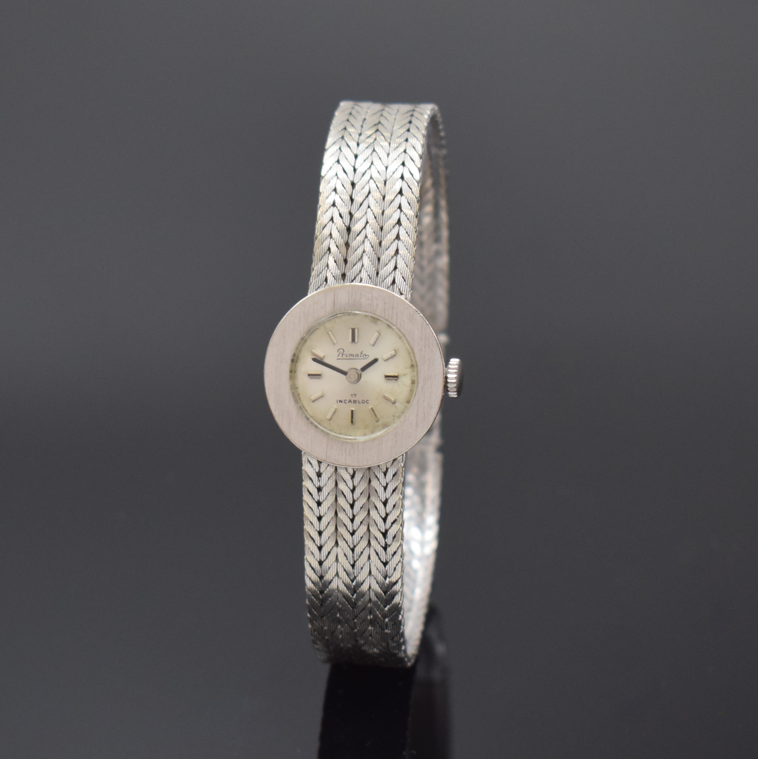 PRIMATO Damenarmbanduhr in WG 585/000, Deutschland/Schweiz um 1965, Handaufzug, 2- teil. Geh. m. integr. Band, Boden aufgedr., silb. Zifferbl. pat., ...