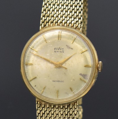 26759743a - BWC 14k yellow gold gents wristwatch, Switzerland around 1960, manual winding, 3- piece construction case with fixed bracelet, snap on case back and bezel, silvered dial patinated, gilded indices and hands, sweep seconds, nickel plated movement calibre ETA 2391, 17 jewels, diameter approx. 33 mm, length approx. 18,5 cm, weight approx. 54g, needs to be overhauled, condition 3