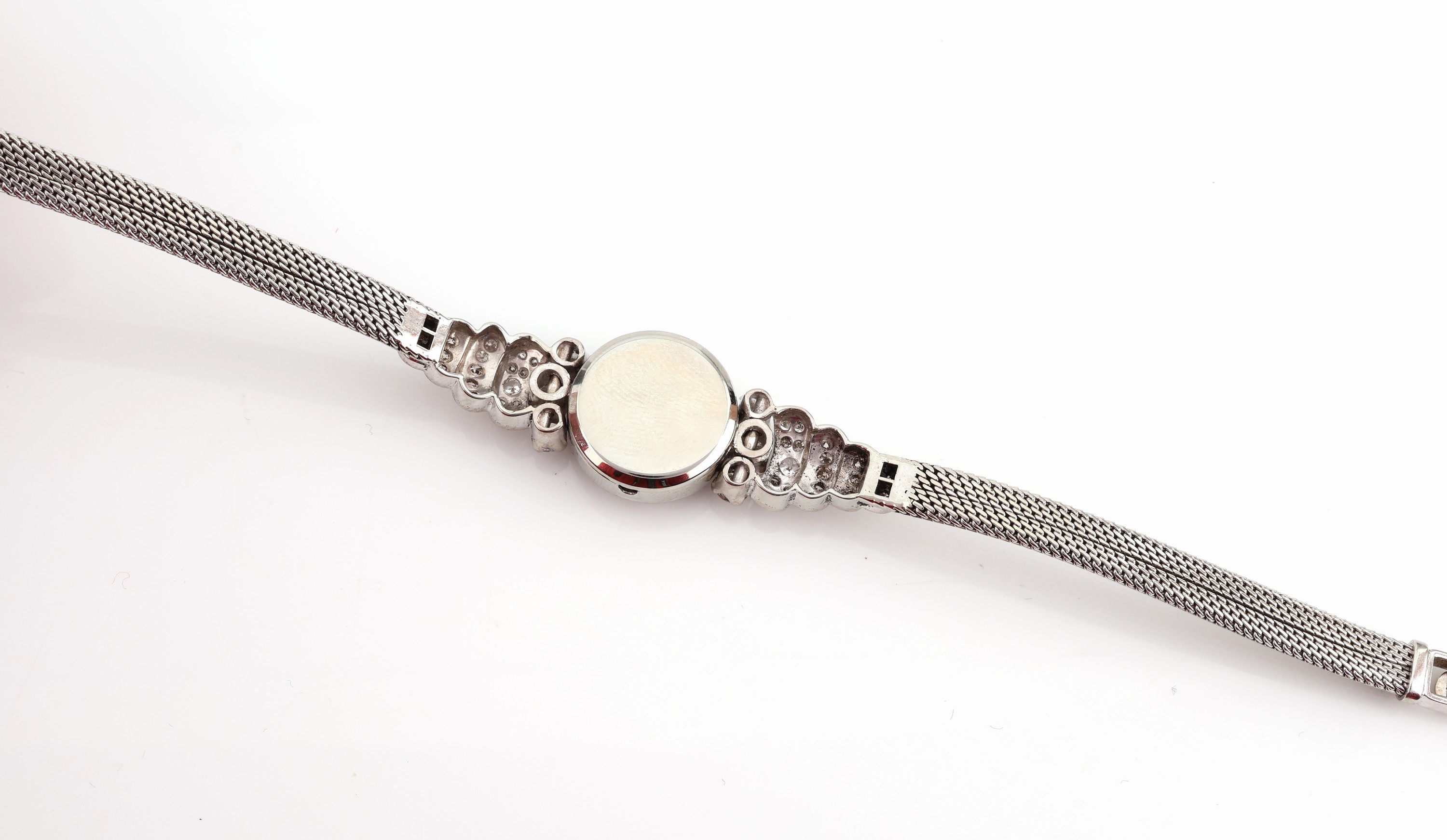 Detail a: 18 kt Gold Rubin-Diamant-Armband, WG 750/000, Mittelteil mit rundfacett. Rubin ca. 5.80 ct (beh.), 68 Brillanten und 8/8- Diamanten zus. ca. 2.00 ct ...