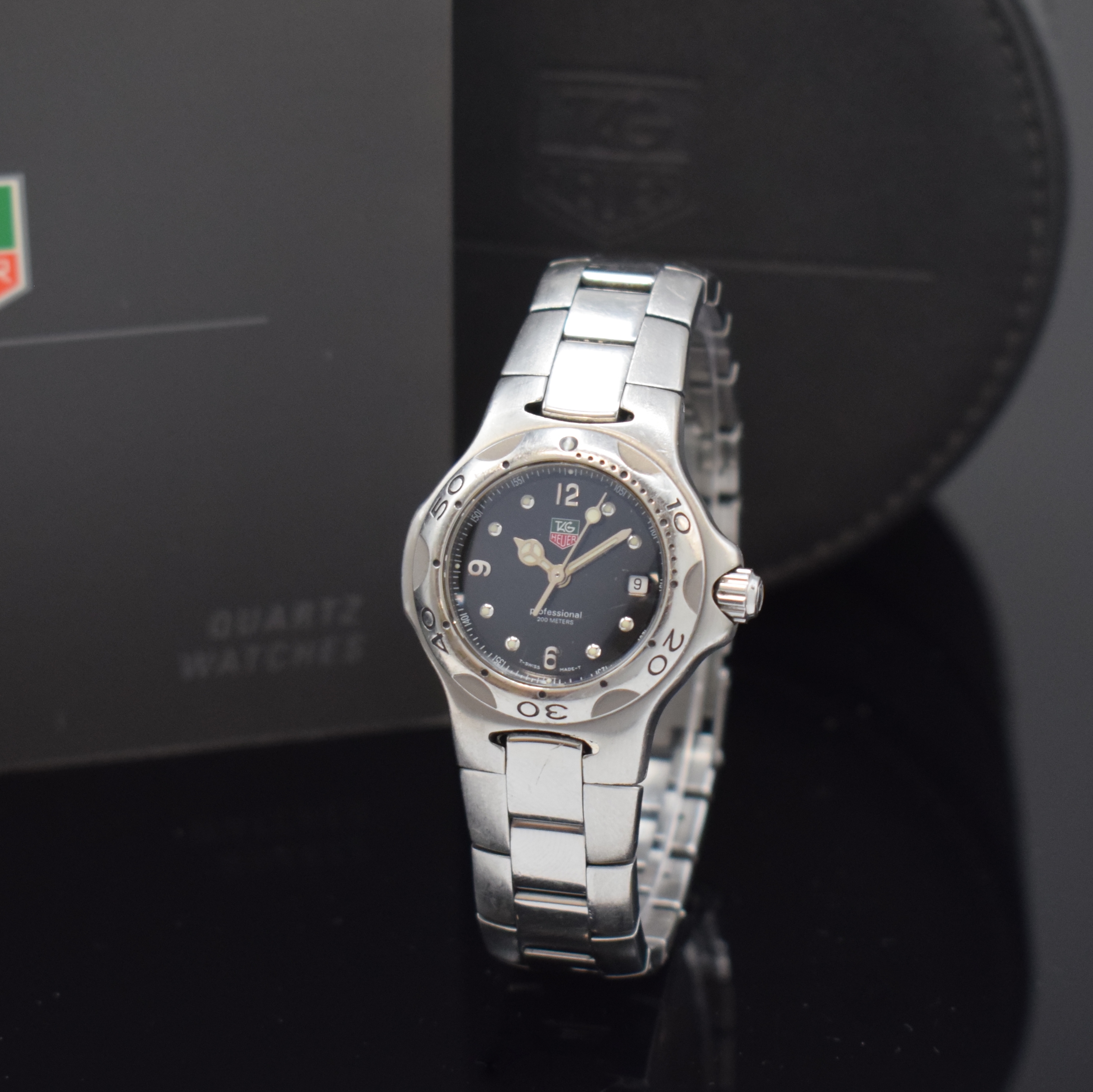 TAG HEUER Kirium Armbanduhr Referenz WL 1312, Schweiz um 1998, quarz, Edelstahlgeh. inkl. Gliederband m. Faltschl., Boden u. Krone verschr., Lünette ...