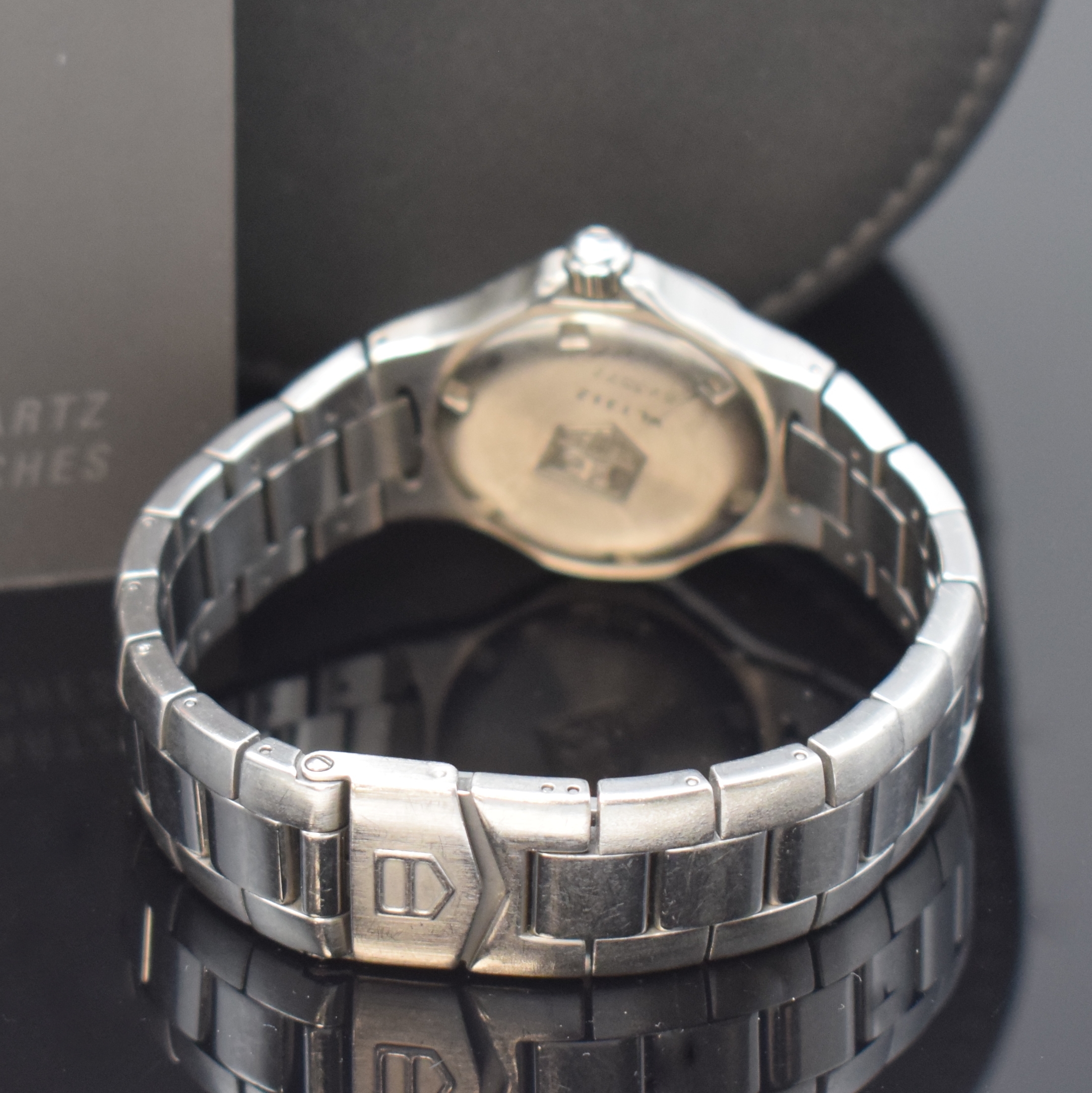 Detail b: TAG HEUER Kirium Armbanduhr Referenz WL 1312, Schweiz um 1998, quarz, Edelstahlgeh. inkl. Gliederband m. Faltschl., Boden u. Krone verschr., Lünette ...