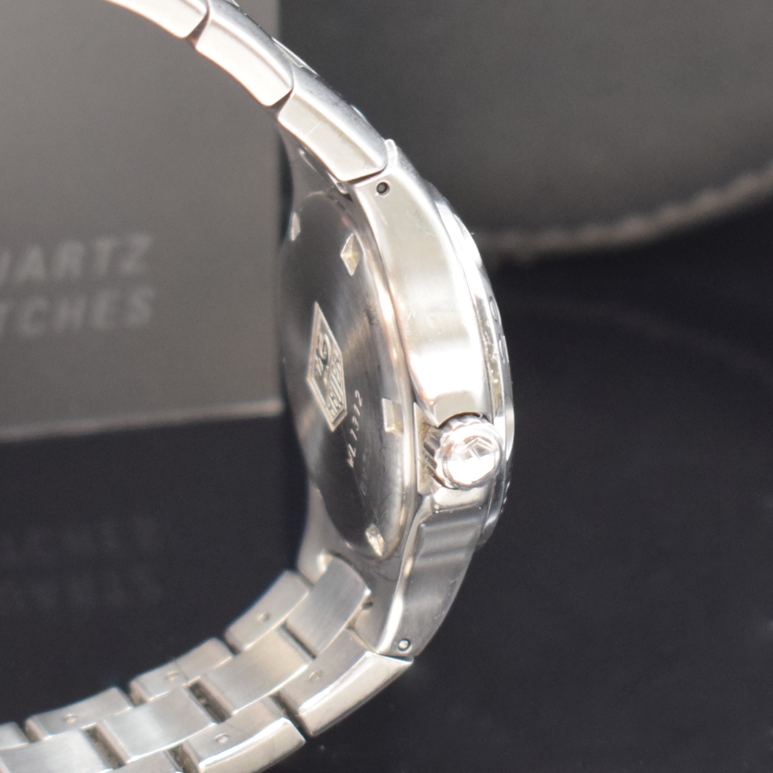 Detail c: TAG HEUER Kirium Armbanduhr Referenz WL 1312, Schweiz um 1998, quarz, Edelstahlgeh. inkl. Gliederband m. Faltschl., Boden u. Krone verschr., Lünette ...