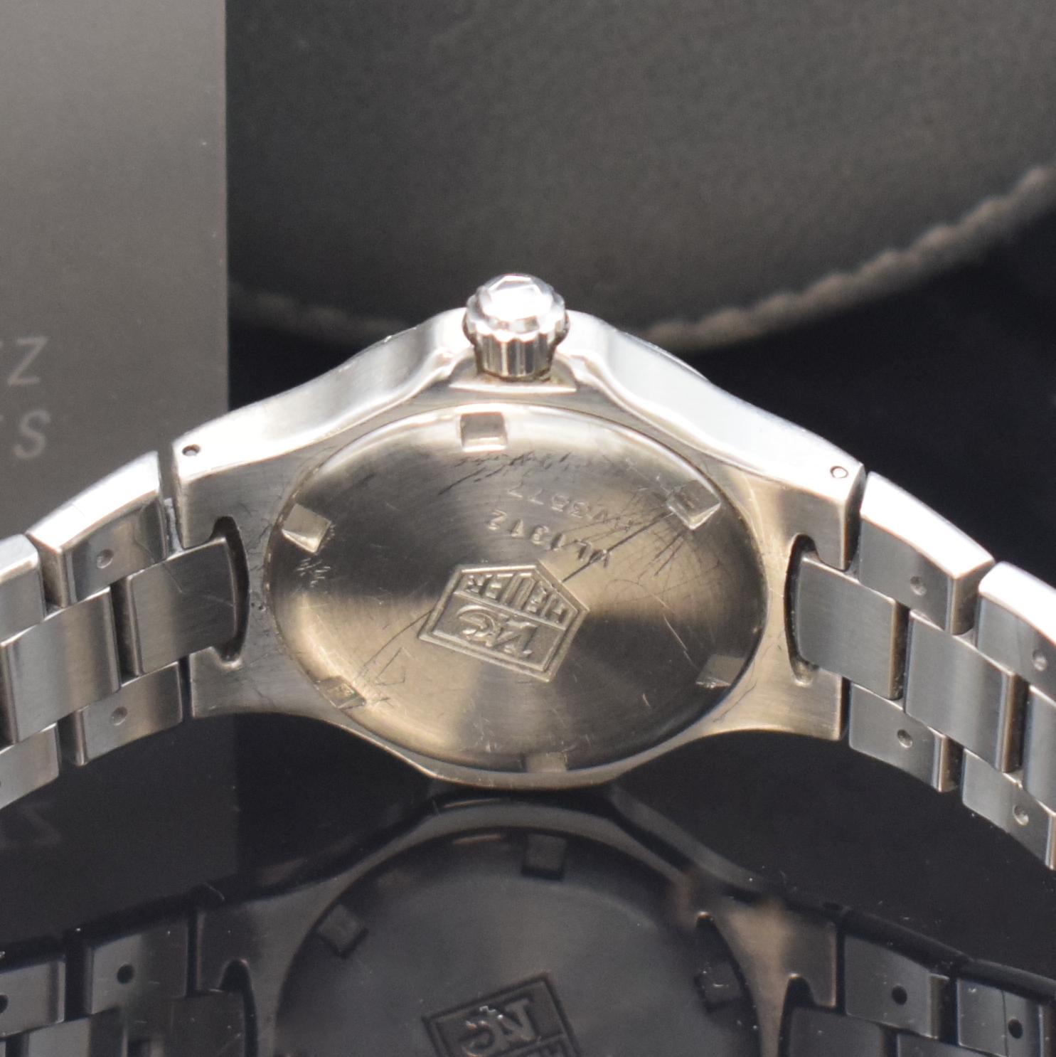 Detail d: TAG HEUER Kirium Armbanduhr Referenz WL 1312, Schweiz um 1998, quarz, Edelstahlgeh. inkl. Gliederband m. Faltschl., Boden u. Krone verschr., Lünette ...