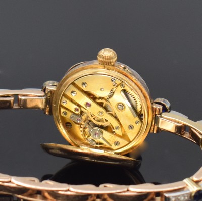 26760995h - LE ROY very rare early high-grade diamond-set wristwatch in 15k pink gold, France around 1910, smooth hinge case, hinged gold-cuvette marked" To the Queen Le Roys & Fils , 57 New Bond Street, London, Paris, Made in France", original patinated heavy strap with sapphires (approx. 1,6 ct) and old cut-diamonds (white/p approx. 2,7 ct.), frame-enamel dial, blue Arabic numerals with red 12, gilded spade hands, gold-plated precision movement, end stone on escape wheel, compensation-balance, diameter approx. 25 mm, weight approx. 35g, condition 2 extraordinary in this quality and version