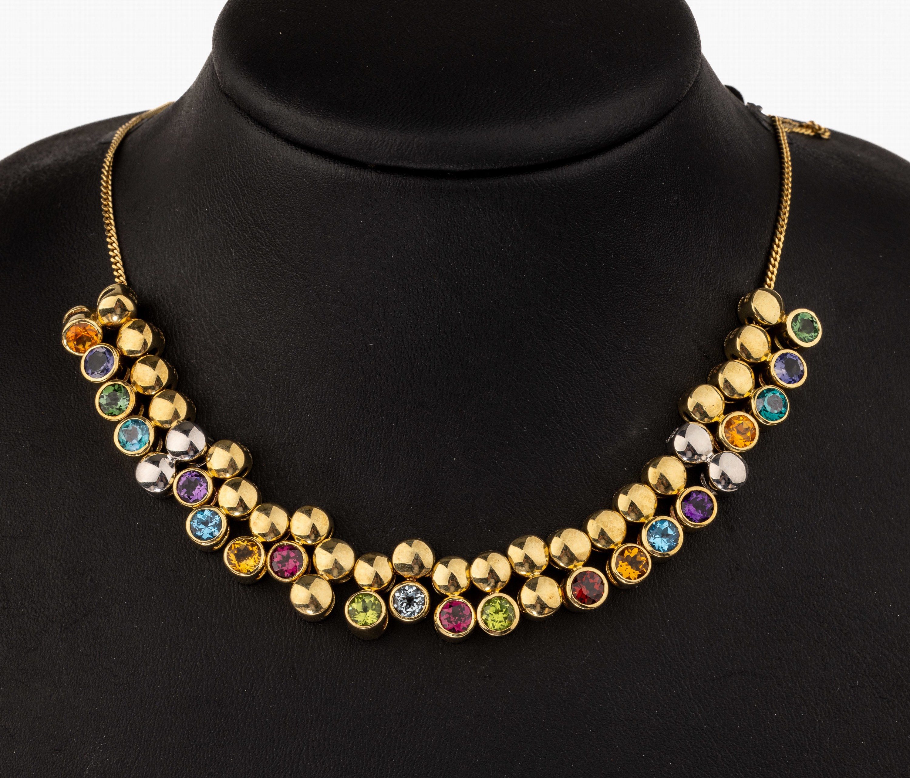 14 kt Gold Farbstein-Collier, GG/WG 585/000, 24 einzelne Glieder, 20 Glieder mit rundfacett. Farbsteinen, u.a. Citrine, Peridots, Turmaline und ...
