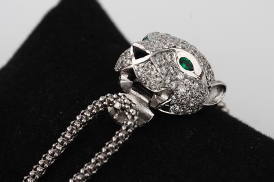 26761165c - 18 kt gold CARTIER PANTHER brilliant-emerald- bracelet
