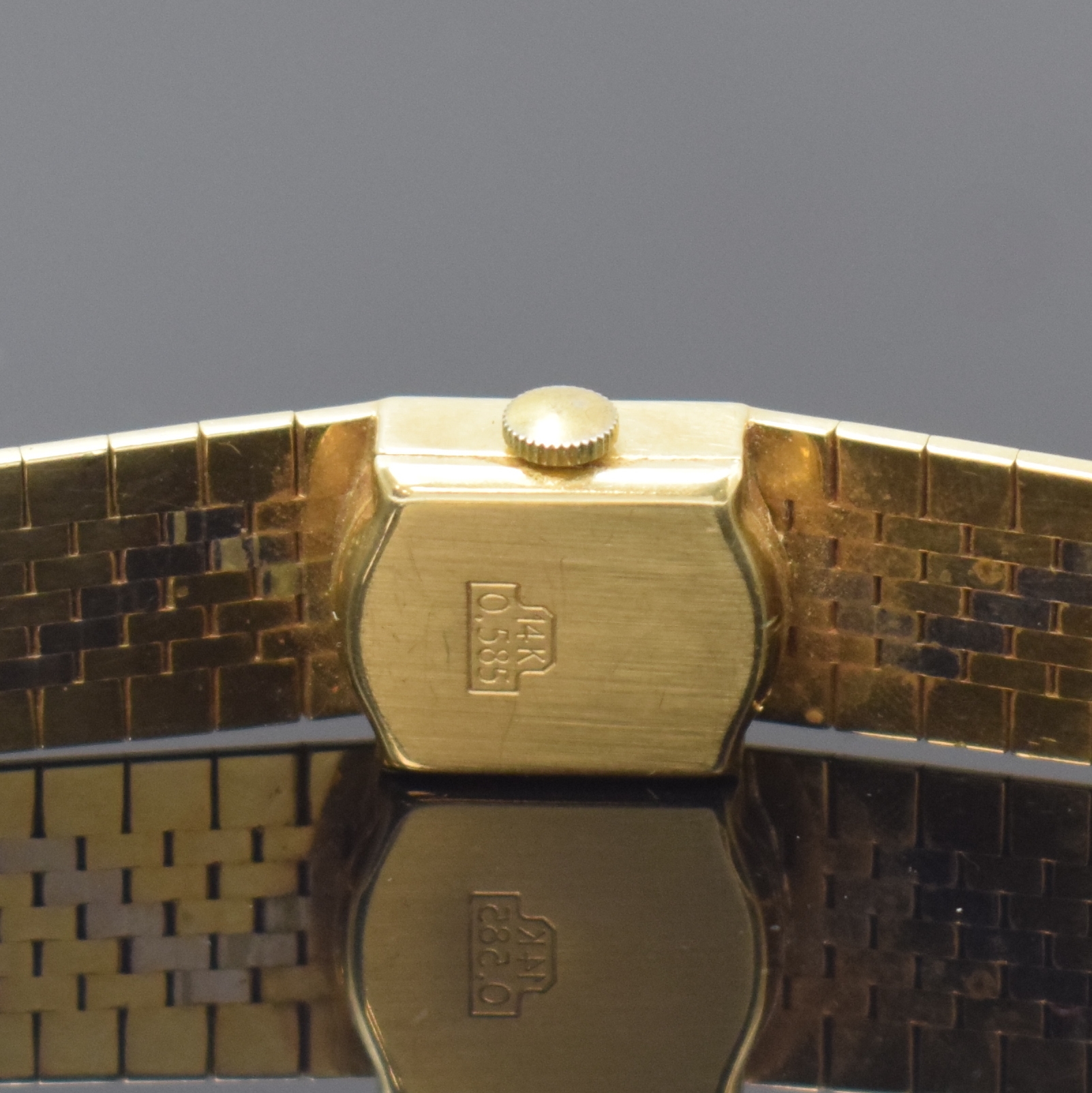 Detail c: CARIB Damenarmbanduhr in GG 585/000, Schweiz um 1970, Handaufzug, Boden aufgedr., silb. Zifferbl. m. aufges. Std.-Ind., gold. Zeiger, Kal. AS 1977, ...