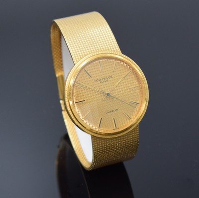 26762562c - PATEK PHILIPPE / GÜBELIN fine 18k yellow gold gents wristwatch reference 3563/3, self winding, Switzerland 1975, milanaise bracelet, so called Backwinder, hand-setting on the back side, screwed down case back, gilded structured dial with raised indices, display of hours, minutes and sweep seconds, rhodium plated movement, calibre 350, Seal of Geneva, 28 jewels, fausses cotes decoration, Gyromax- balance, adjusted in 5 positions, Breguet- hairspring, diameter approx. 35 mm, length approx. 17,5 cm, signs of use due to age, overhaul recommended at buyer's expense, condition 2-3