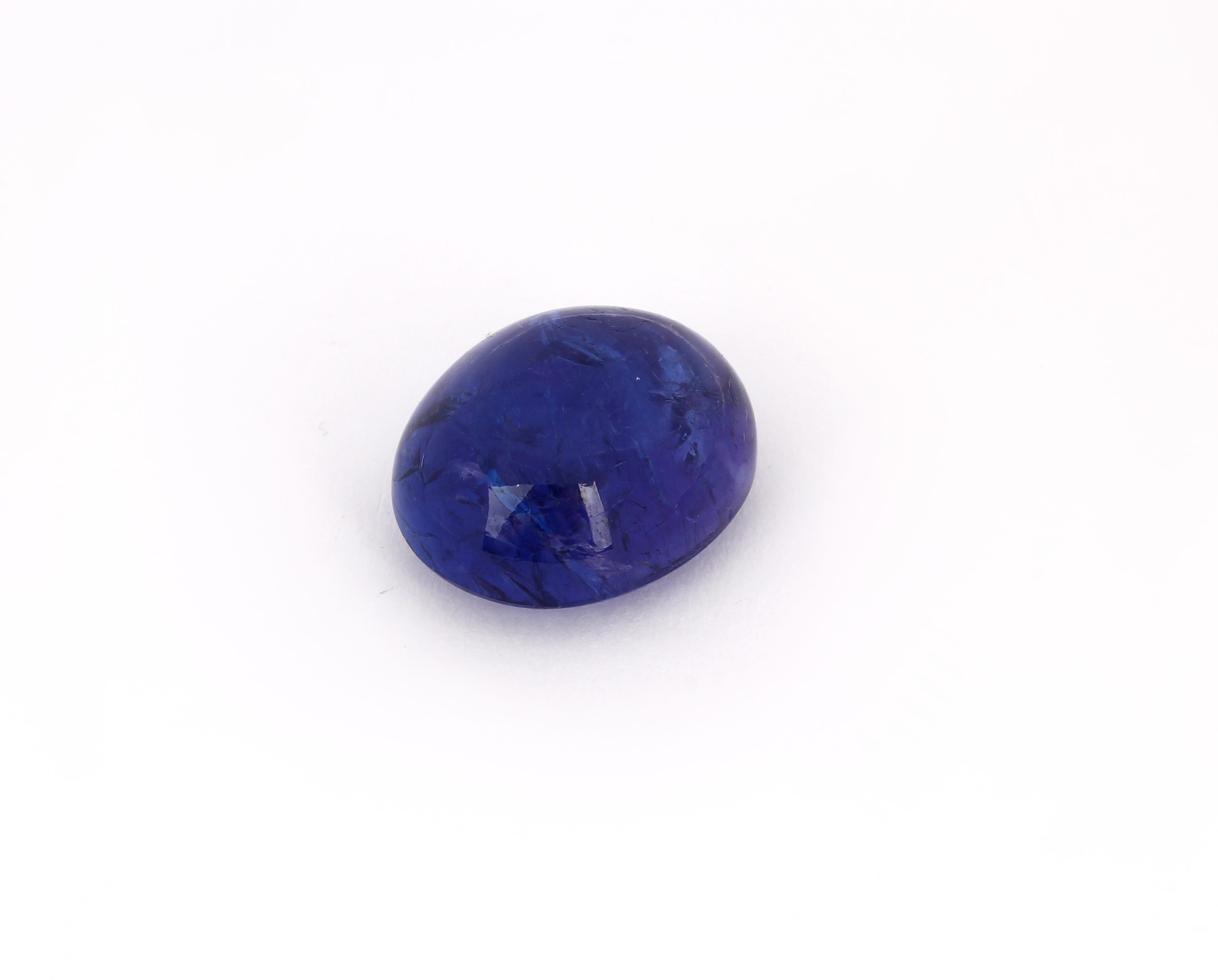 Loser Tansanit, 21.88 ct, ovaler Cabochon, bluish violet, ca. 17.83 x 14.74 x 9.52 mm mitIGI-Expertise