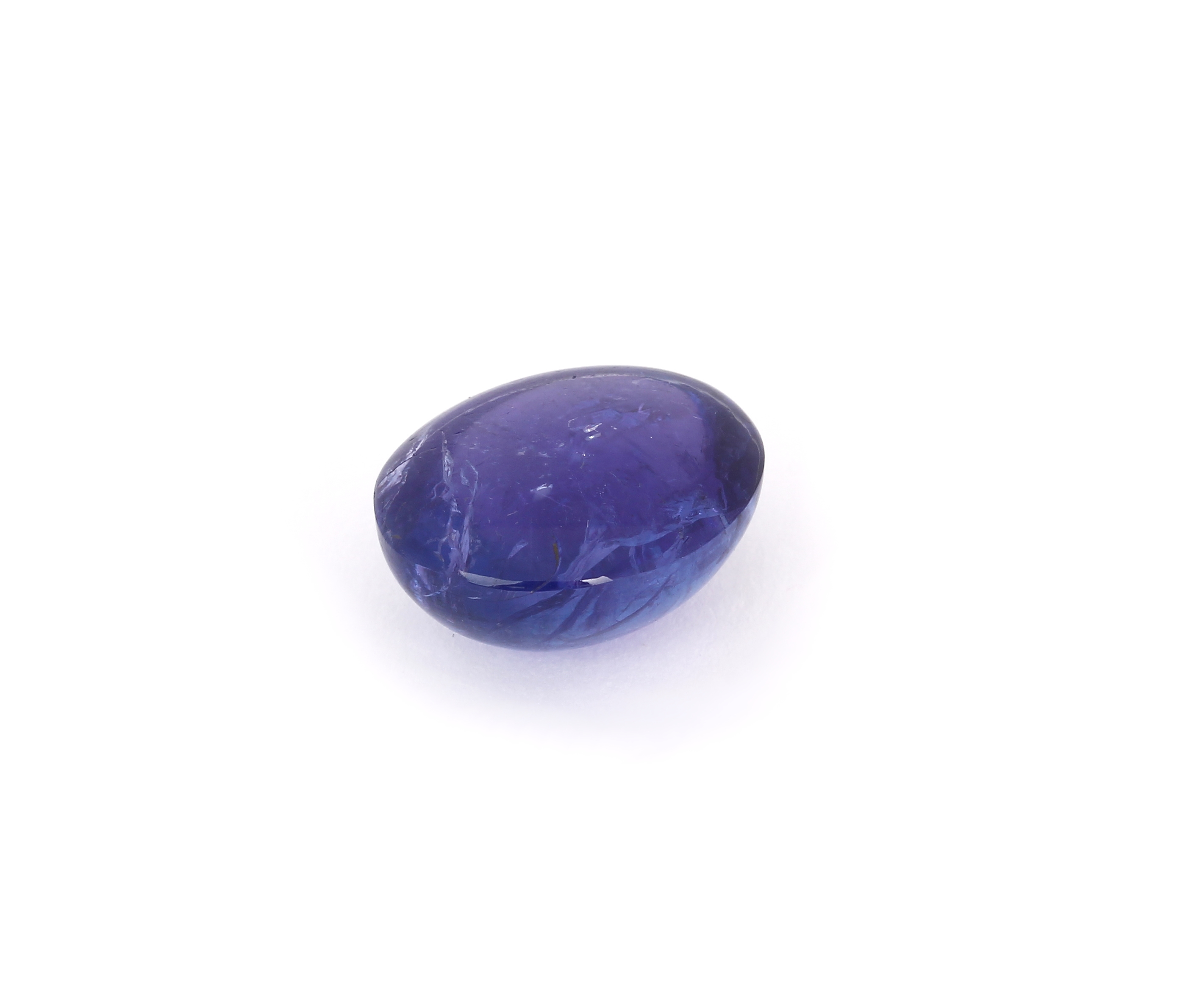 Detail a: Loser Tansanit, 21.88 ct, ovaler Cabochon, bluish violet, ca. 17.83 x 14.74 x 9.52 mm mitIGI-Expertise