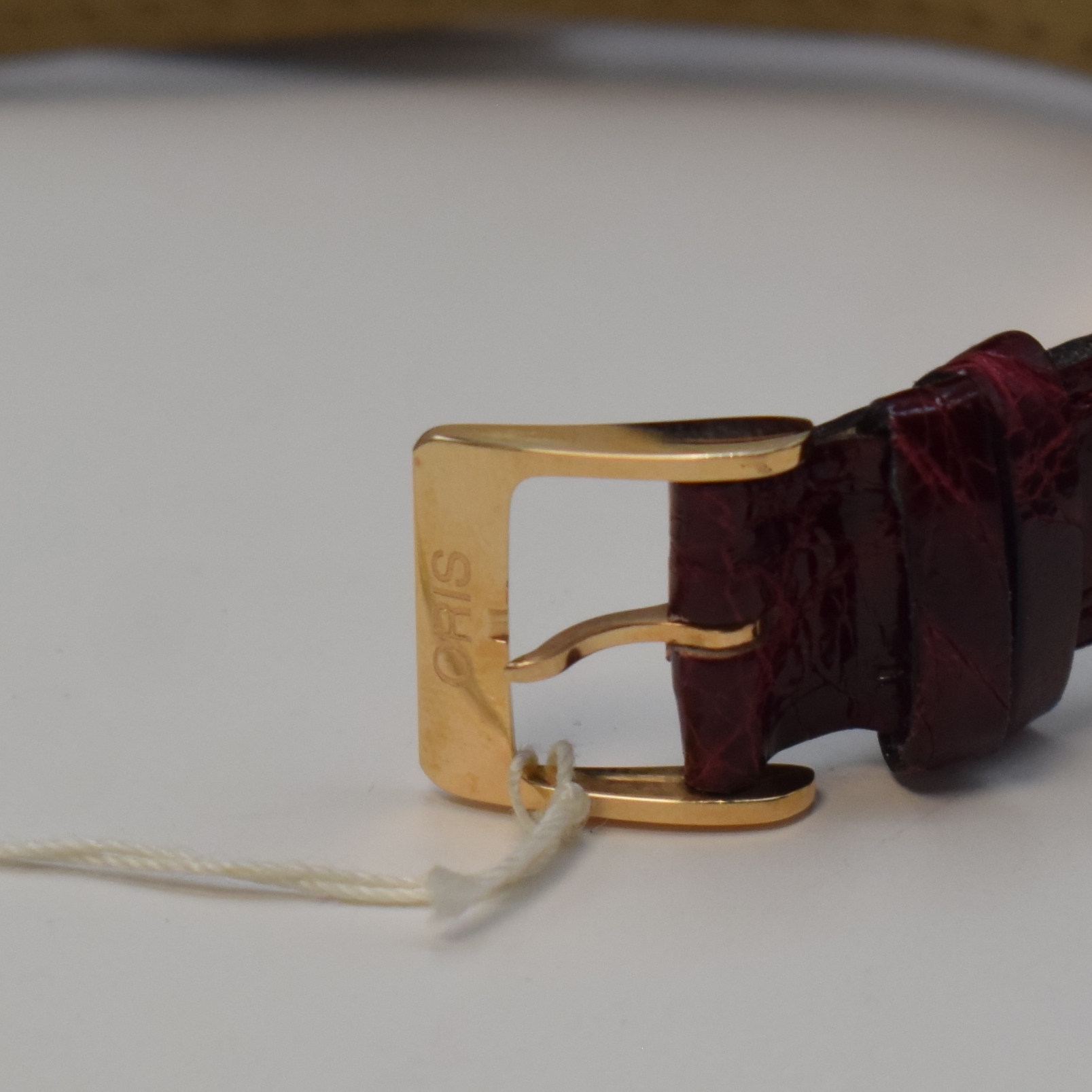 Detail c: ORIS nahezu neuwertige auf 90 Stück limitierte Armbanduhr mit Mondphase und Datum in RG 750/000, Schweiz um 1994, Automatik, rechteckiges Geh. m. ...