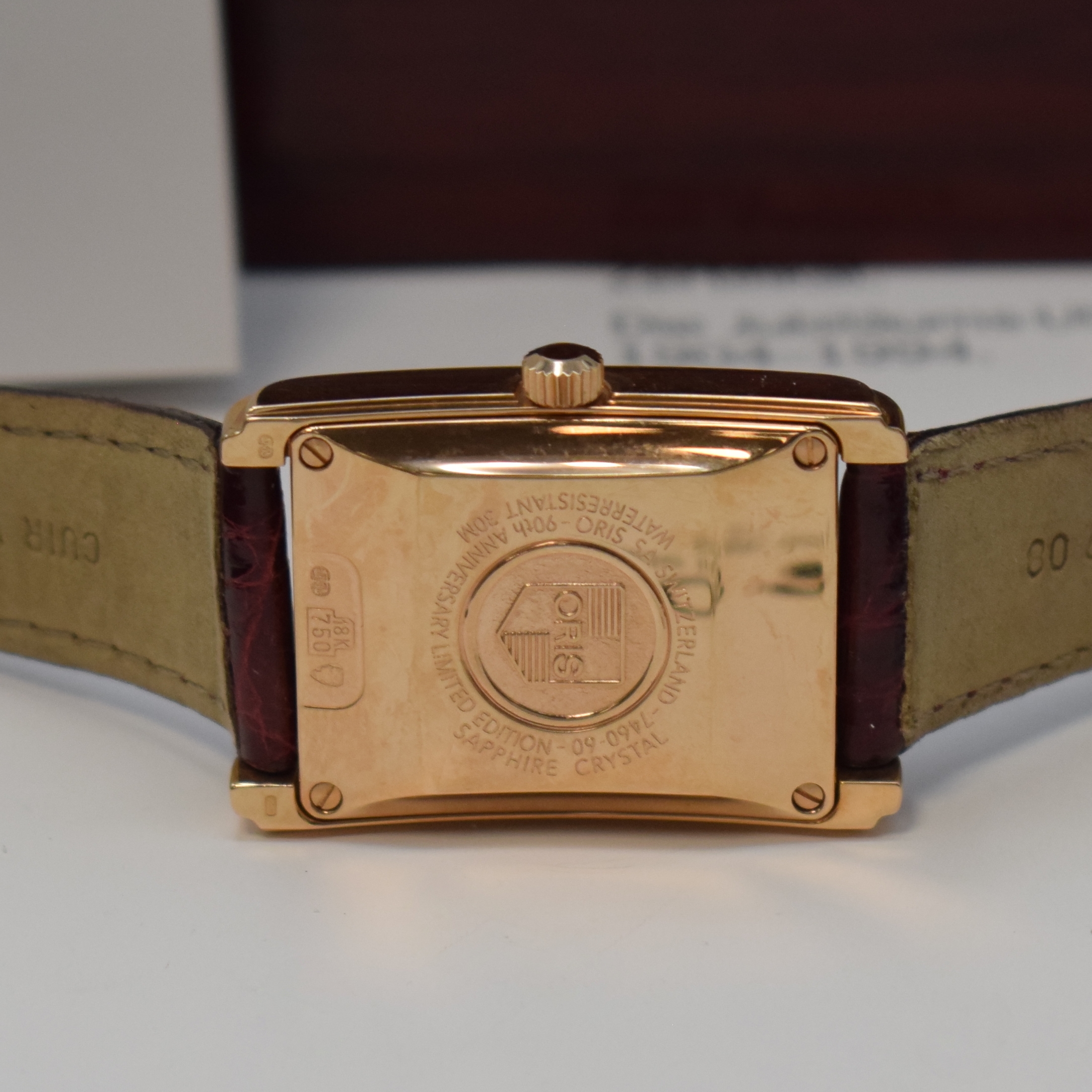 Detail e: ORIS nahezu neuwertige auf 90 Stück limitierte Armbanduhr mit Mondphase und Datum in RG 750/000, Schweiz um 1994, Automatik, rechteckiges Geh. m. ...