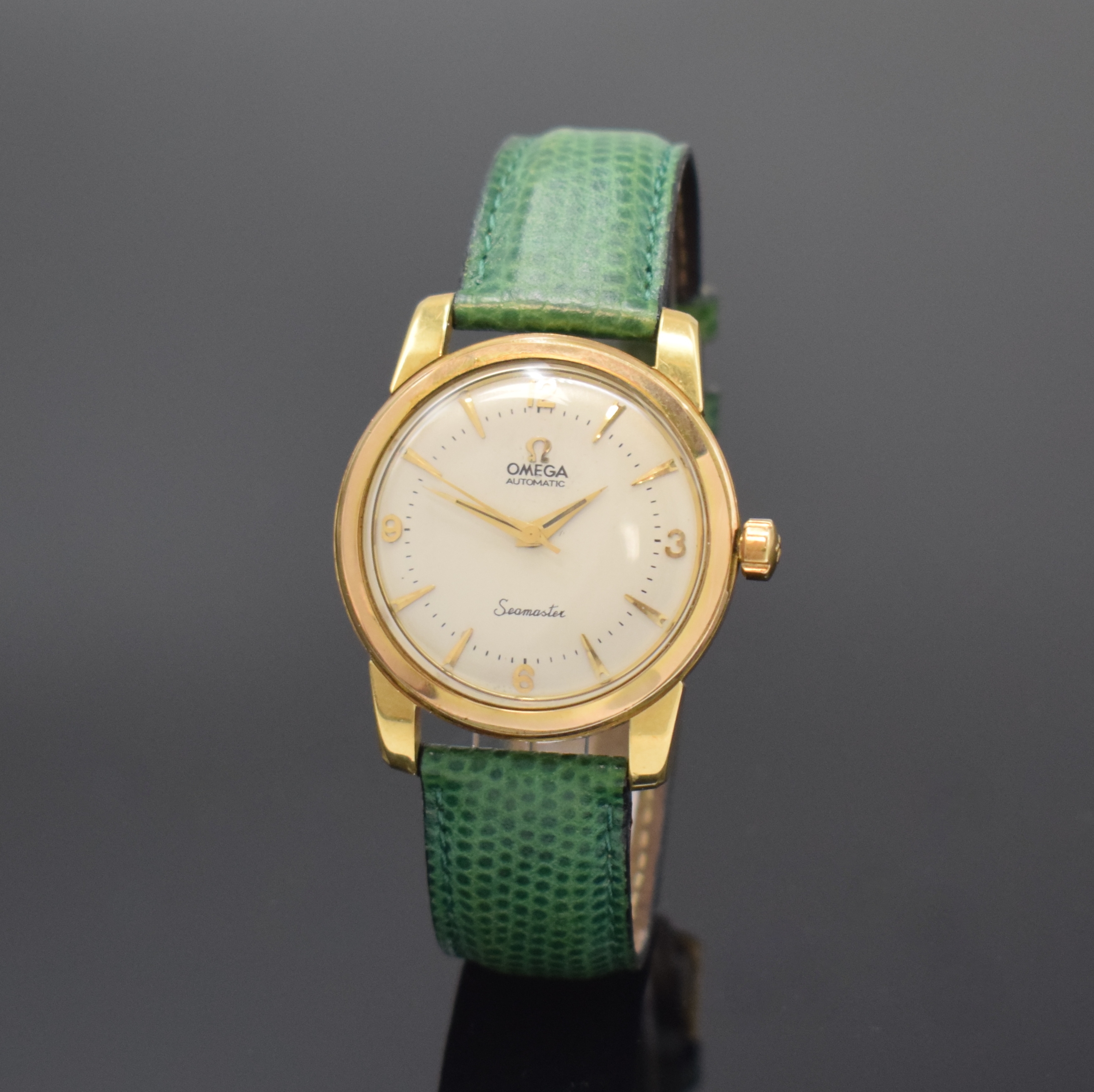 OMEGA Seamaster Armbanduhr Referenz 2577SC in GG 750/000, Schweiz um 1953, Hammerautomatik, verschr. Geh., verg. Lünette später, silb. Zifferbl. ...
