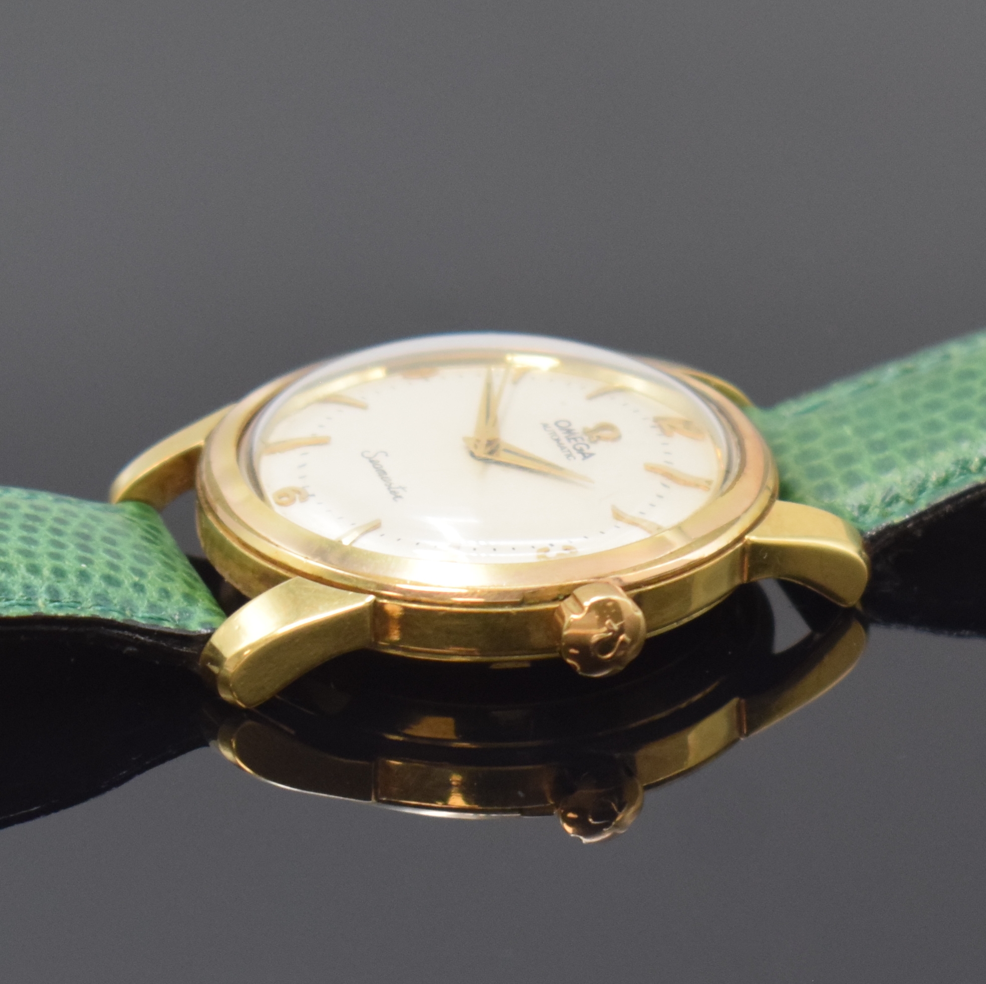 Detail b: OMEGA Seamaster Armbanduhr Referenz 2577SC in GG 750/000, Schweiz um 1953, Hammerautomatik, verschr. Geh., verg. Lünette später, silb. Zifferbl. ...