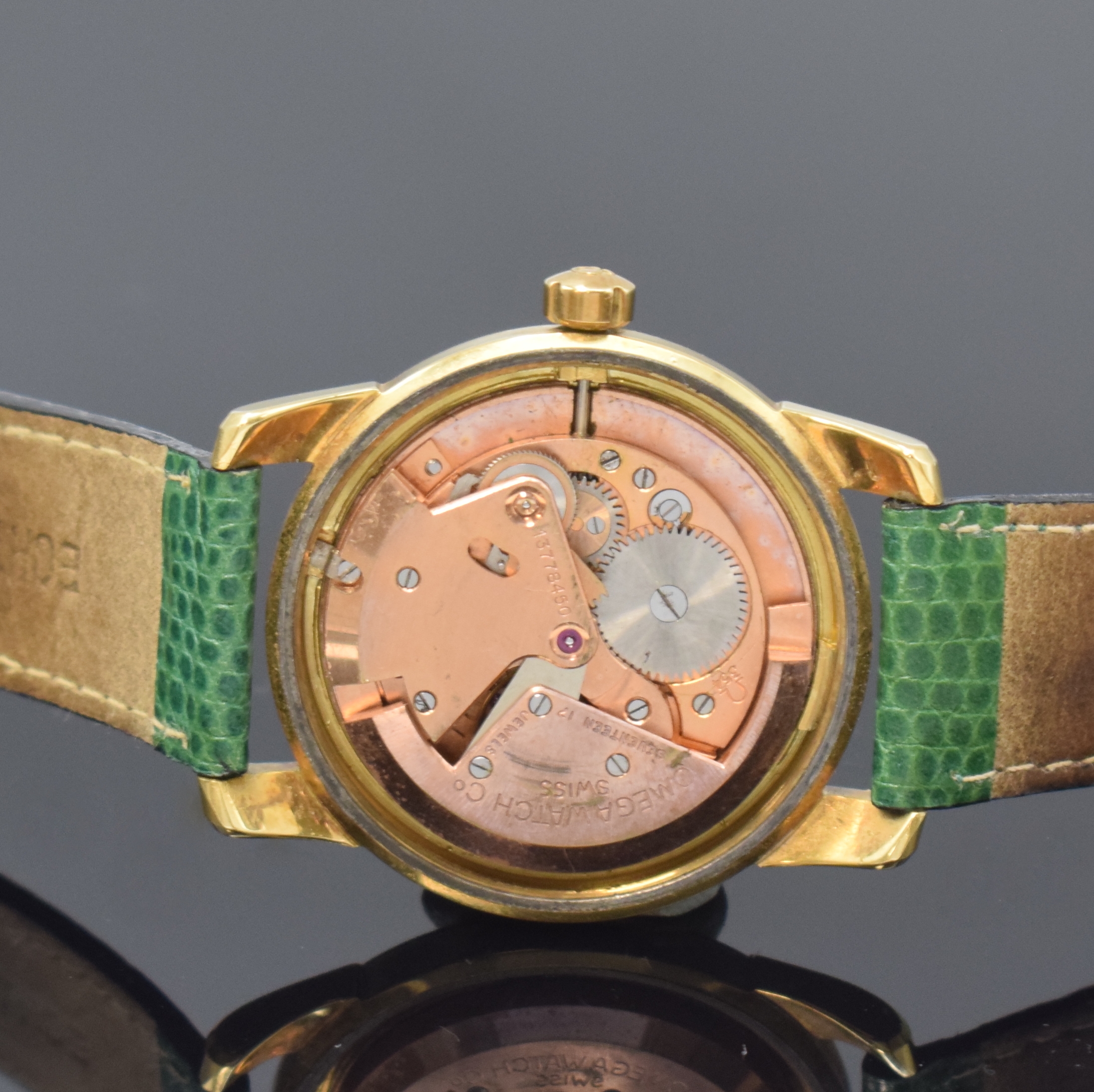 Detail d: OMEGA Seamaster Armbanduhr Referenz 2577SC in GG 750/000, Schweiz um 1953, Hammerautomatik, verschr. Geh., verg. Lünette später, silb. Zifferbl. ...